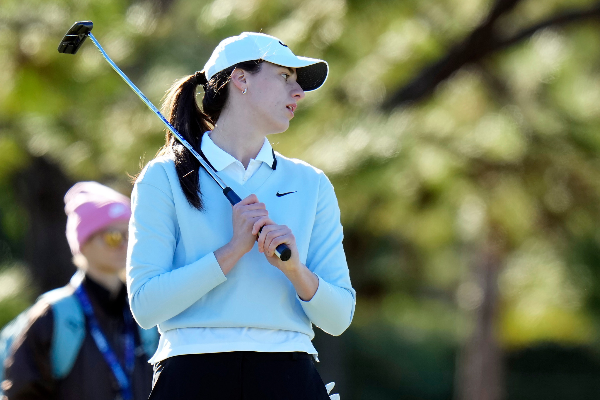 Caitlin Clark reacts to a missed putt on the 1st green during a pro-am for The Annika LPGA golf
