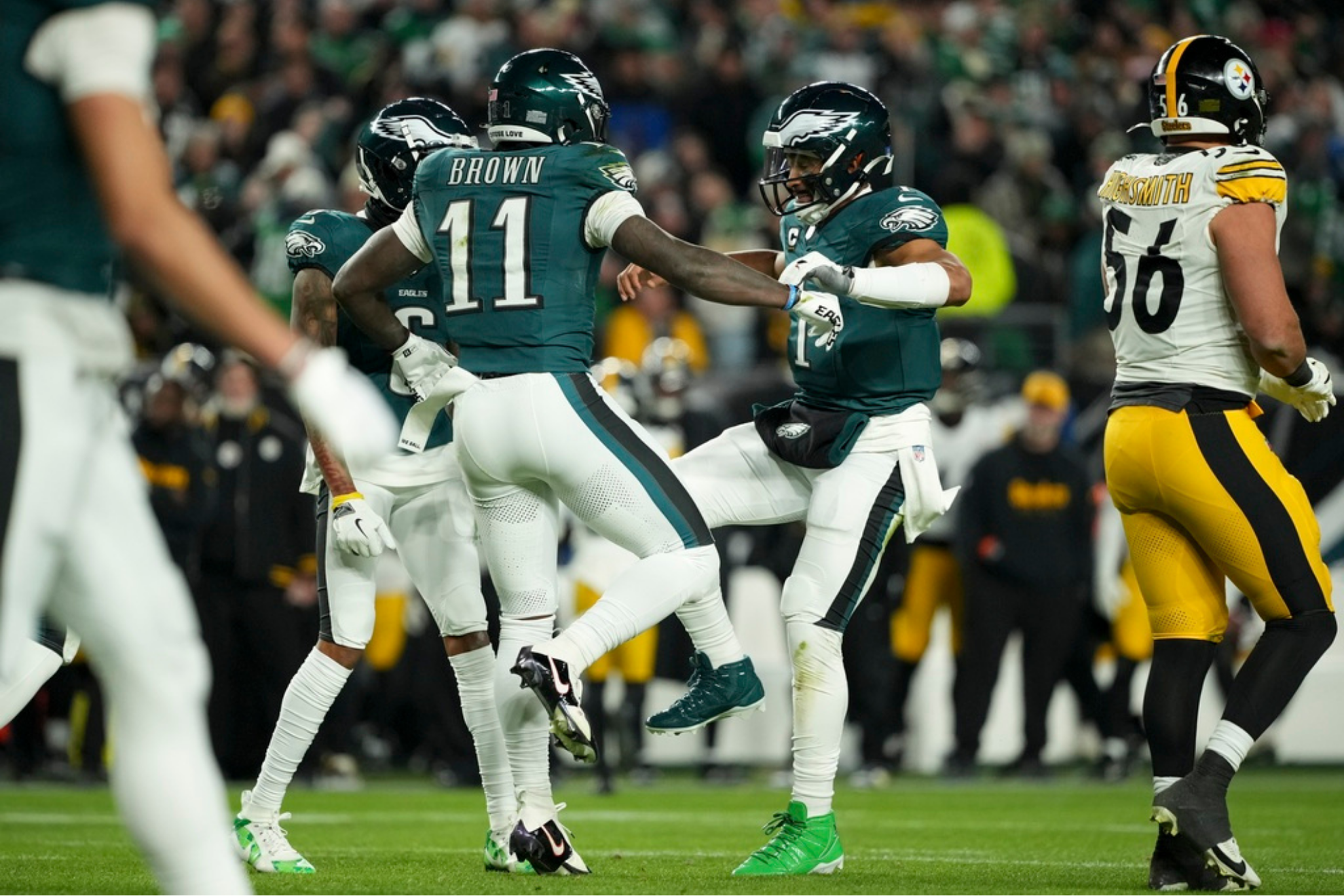 Philadelphia Eagles wide receiver A.J. Brown  celebrates his touchdown with teammates Jalen Hurts