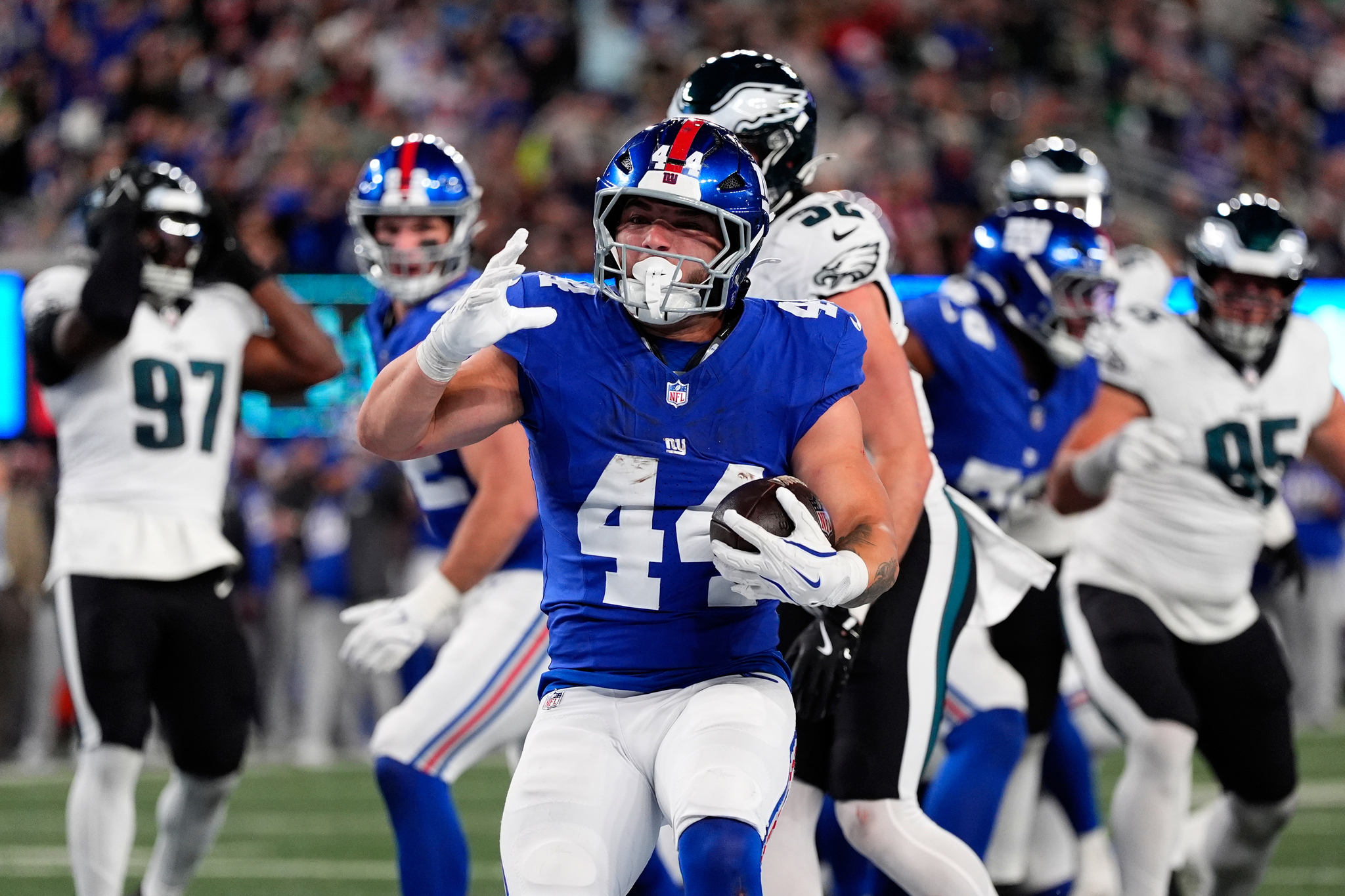 New York Giants Cam Skattebo reacts after scoring a touchdown during an NFL game against the Philadelphia Eagles