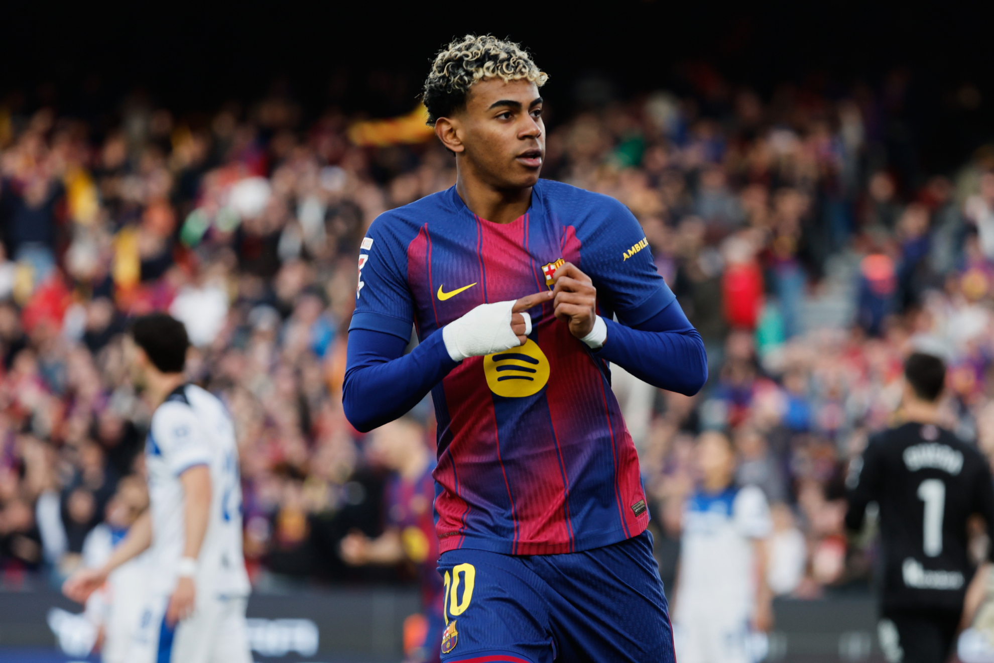Barcelonas Lamine Yamal celebrates after scoring his sides first goal during a Spanish La Liga soccer match between Barcelona and Alaves, in Barcelona, Spain, Saturday, Nov. 29, 2025.