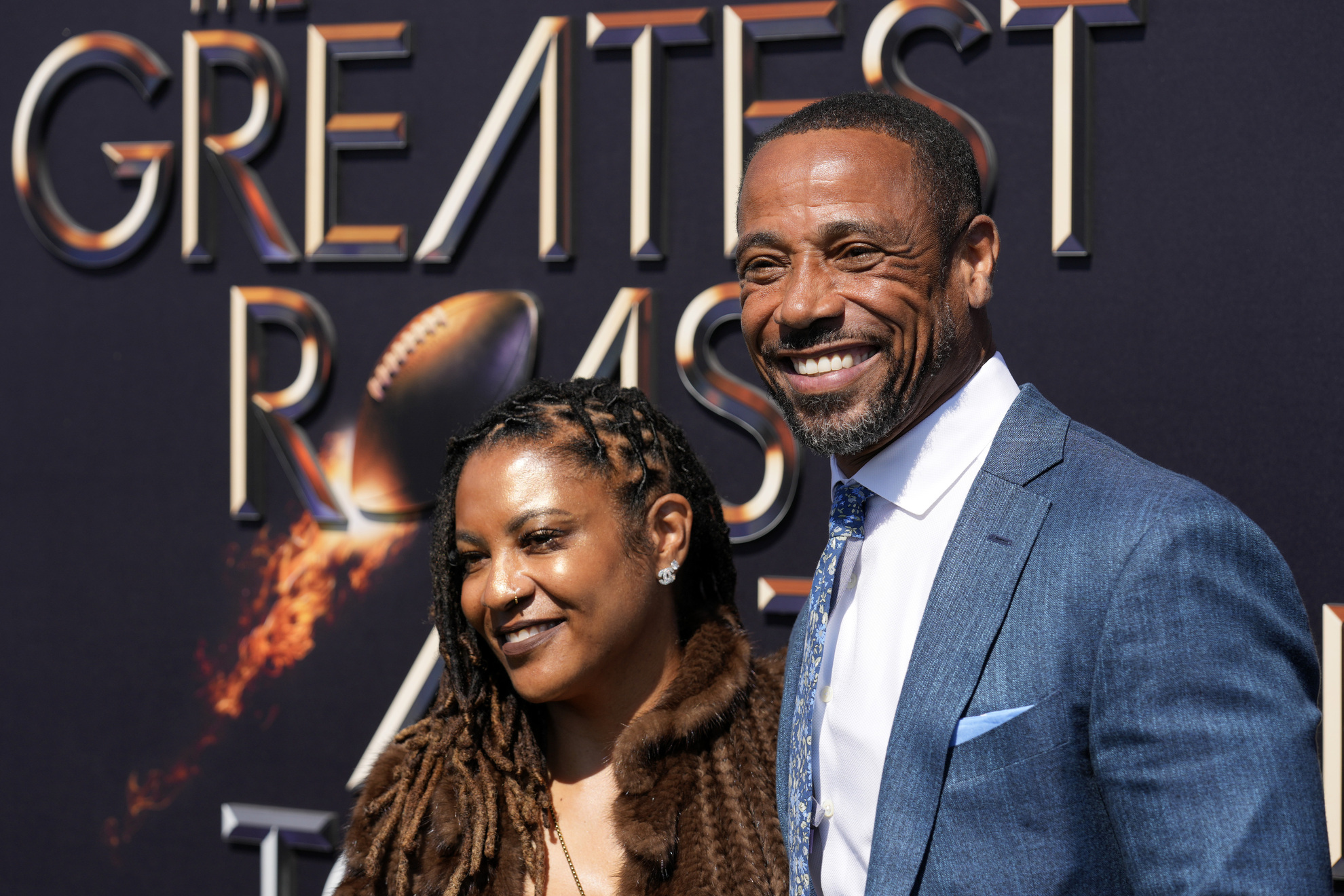 Retired NFL player Rodney Harrison and his wife Erika