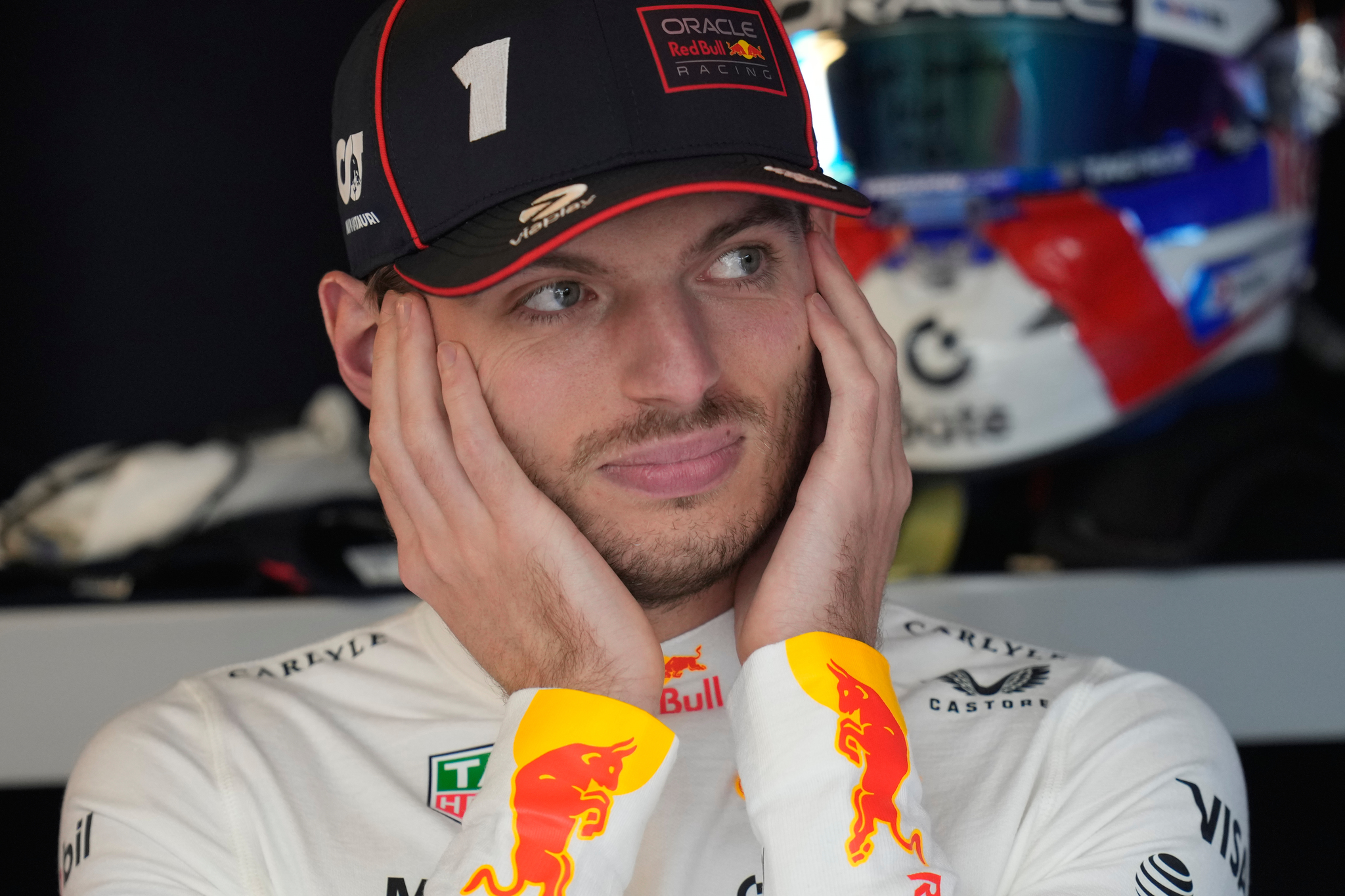 Red Bull driver Max  lt;HIT gt;Verstappen lt;/HIT gt; of the Netherlands gets ready for the first practice for the he Abu Dhabi Formula One Grand Prix in Abu Dhabi, United Arab Emirates, Friday, Dec. 5, 2025. (AP Photo/Darko Bandic)