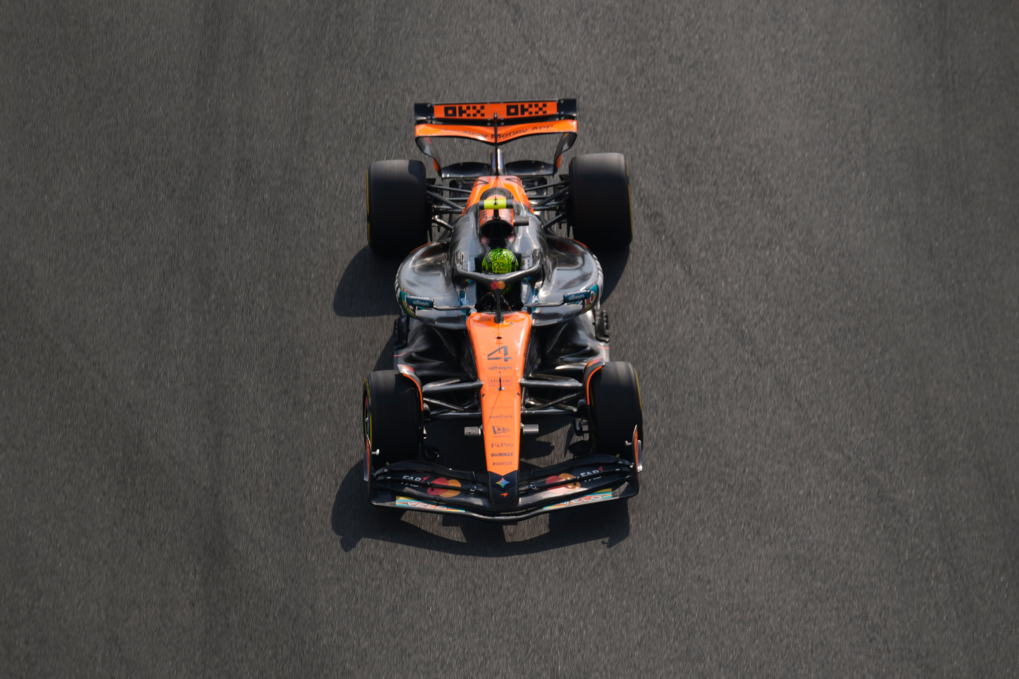 McLaren driver Lando  lt;HIT gt;Norris lt;/HIT gt; of Britain steers his car during the first practice ahead of the Formula One Abu Dhabi Grand Prix at the Yas Marina Circuit in Abu Dhabi, UAE, Friday, Dec. 5, 2025. (AP Photo/Altaf Qadri)