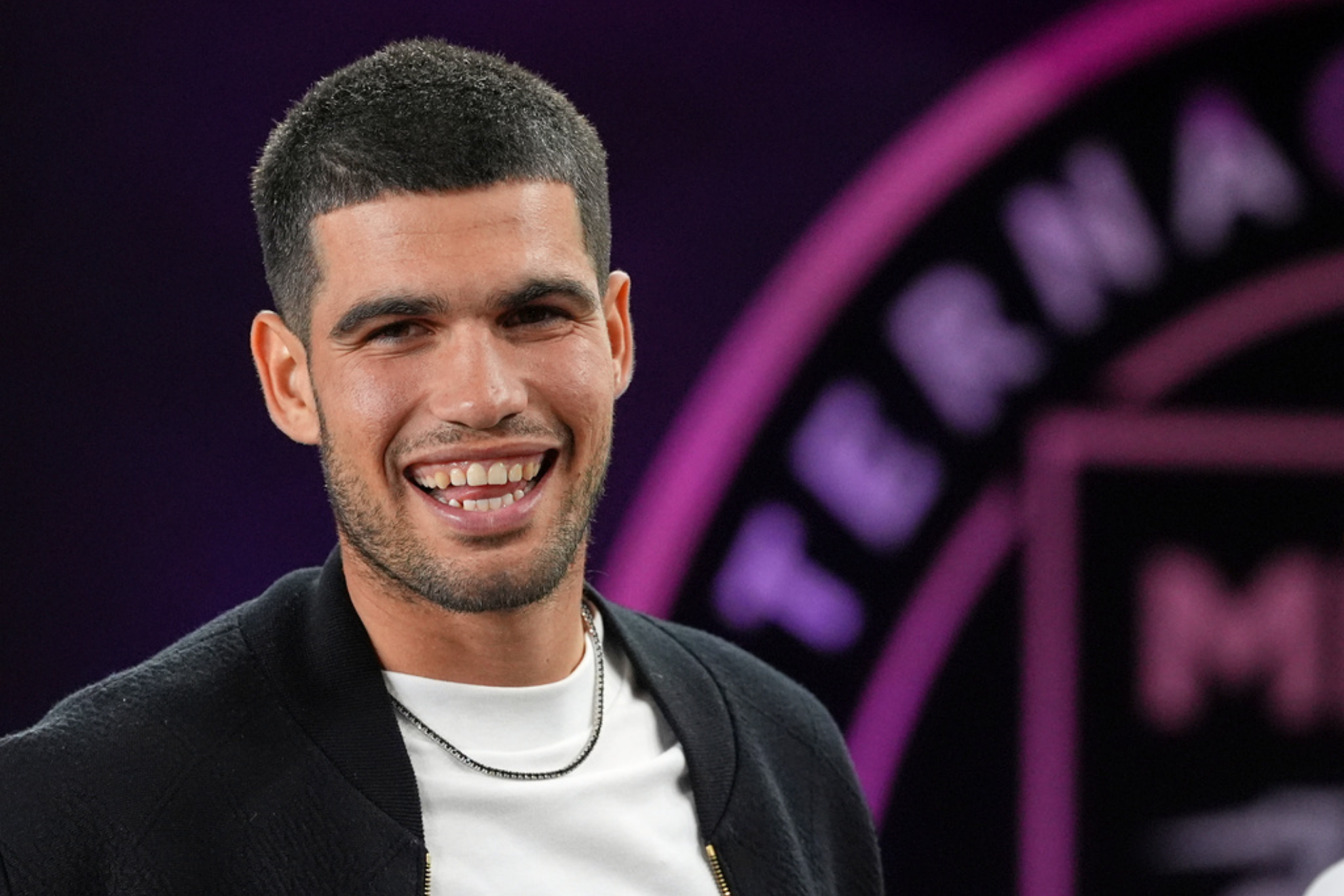 Tennis star Carlos Alcaraz stands on the sideline at the start of an MLS Eastern Conference final soccer match between Inter Miami and New York City FC
