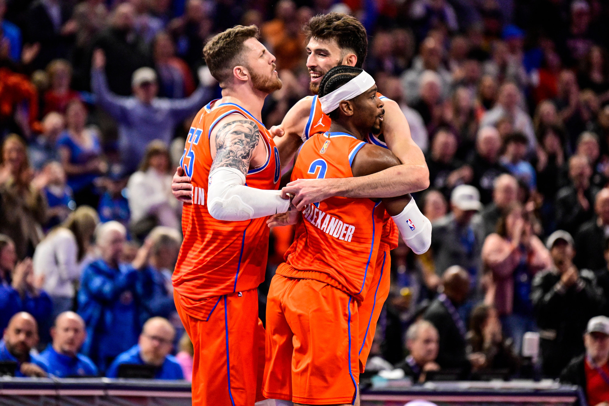 Oklahoma City Thunder C/F Chet Holmgren (7), Center, celebrates with Thunder C/FIsaiah Hartenstein (55) and Thunder guard Shai Gilgeous-Alexander (2)