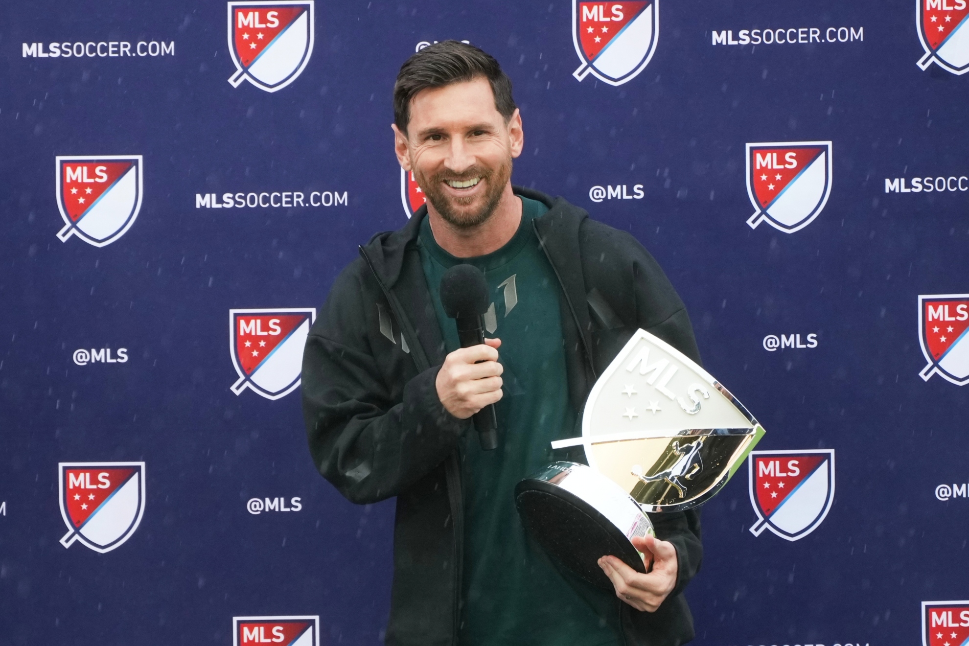 Leo Messi with the MLS MVP trophy