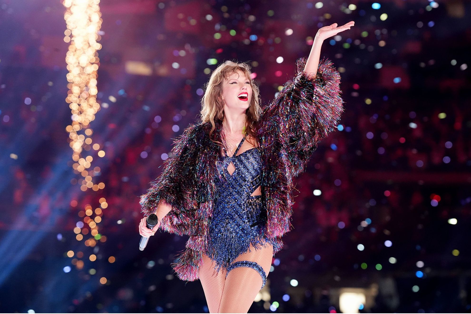 Taylor Swift waves to the crowd in New Orleans in October 2024