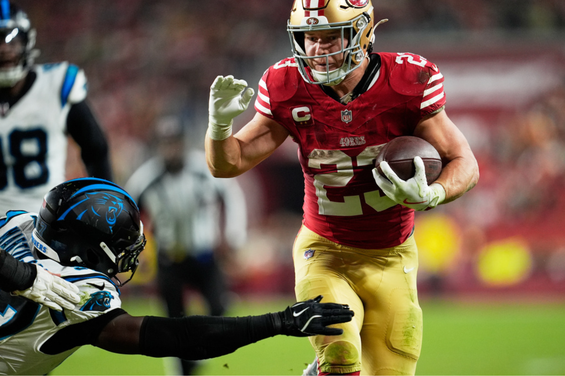 San Francisco 49ers running back Christian McCaffrey runs for a touchdown against the Carolina Panthers