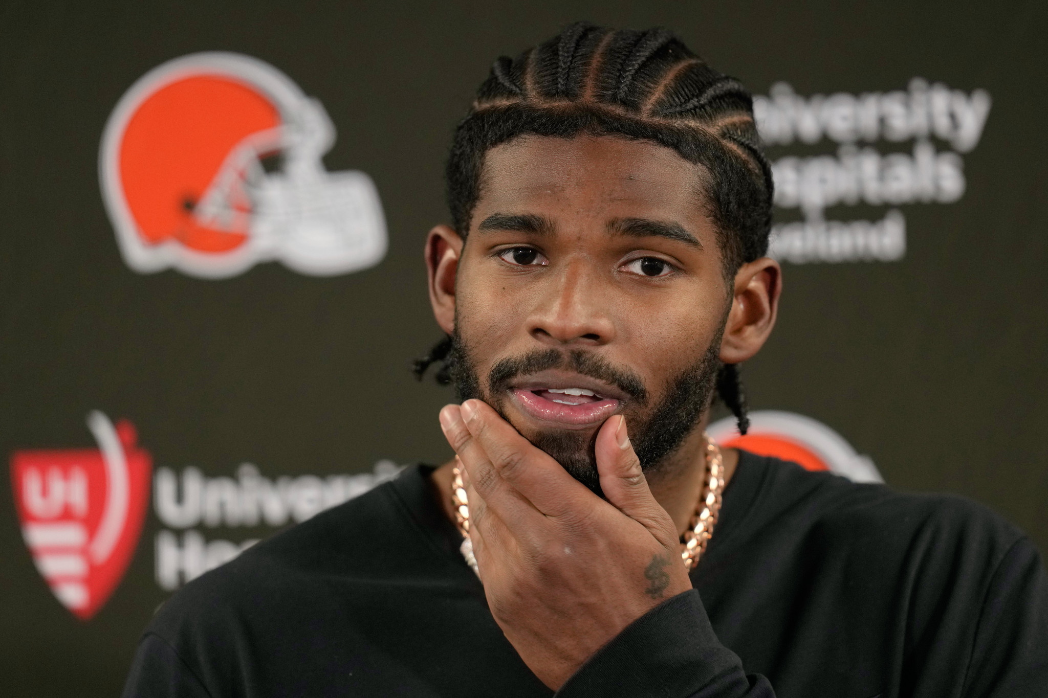 Cleveland Browns quarterback Shedeur Sanders speaks during a news conference after an NFL football game against the Chicago Bears