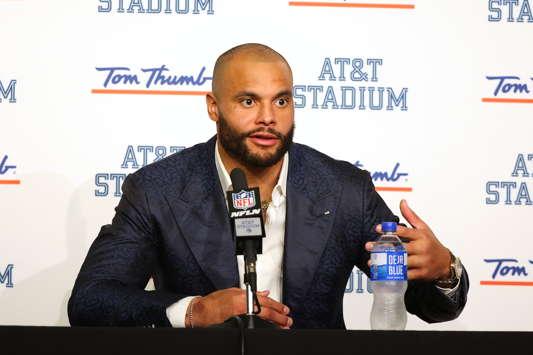 Dallas Cowboys quarterback Dak Prescott answers questions after an NFL football game against the Los Angeles Chargers