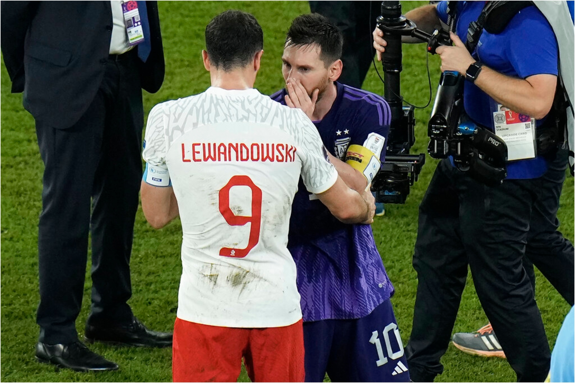 Polands Robert Lewandowski, left, interacts with Argentinas Lionel Messi.