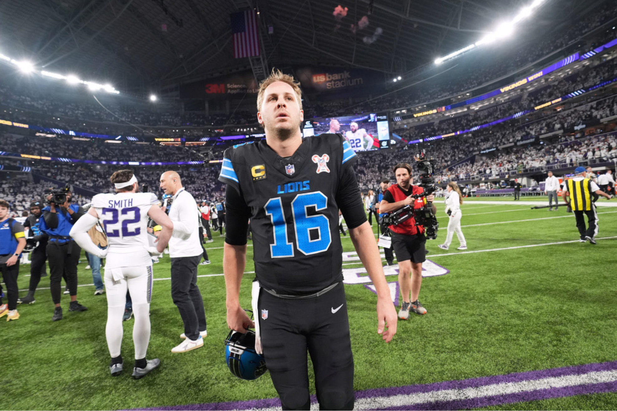 Detroit Lions quarterback Jared Goff walks off the field