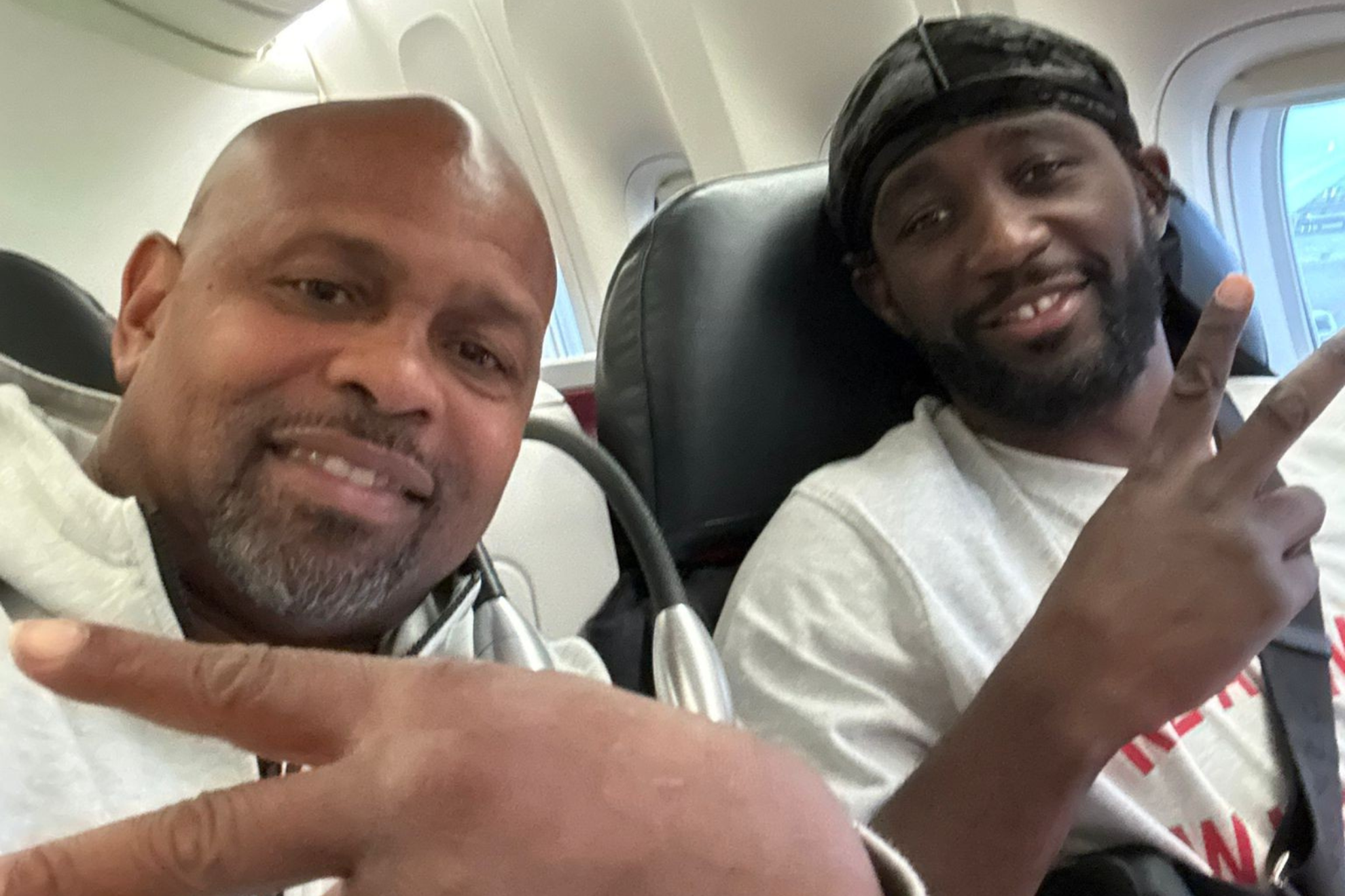 Roy Jones Jr. poses for a picture on a plane with Terence Crawford.