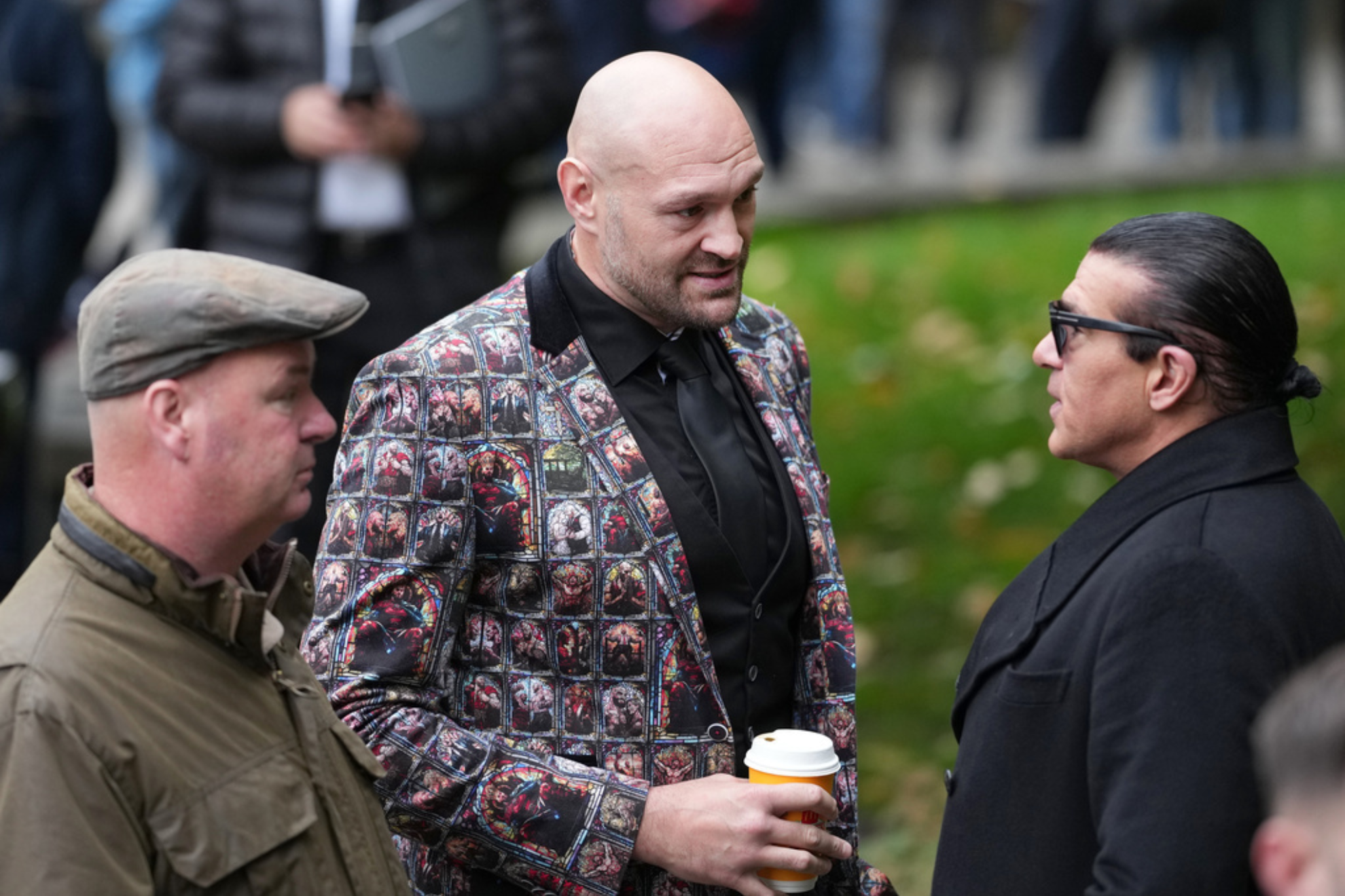 Boxer Tyson Fury, centre and actor Tamer Hassan attend the funeral of boxer Ricky Hatton