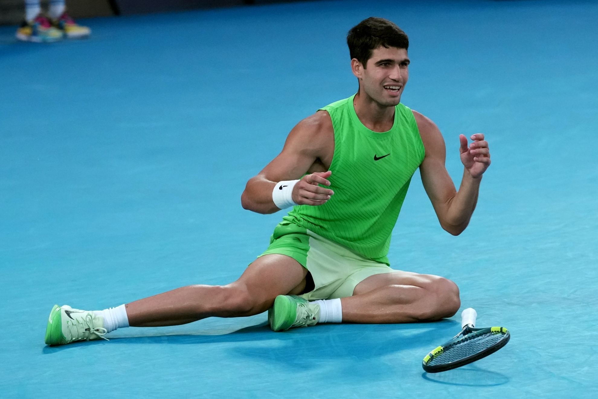 Carlos Alcaraz celebrates after defeating Alexander Zverev in their semifinal.