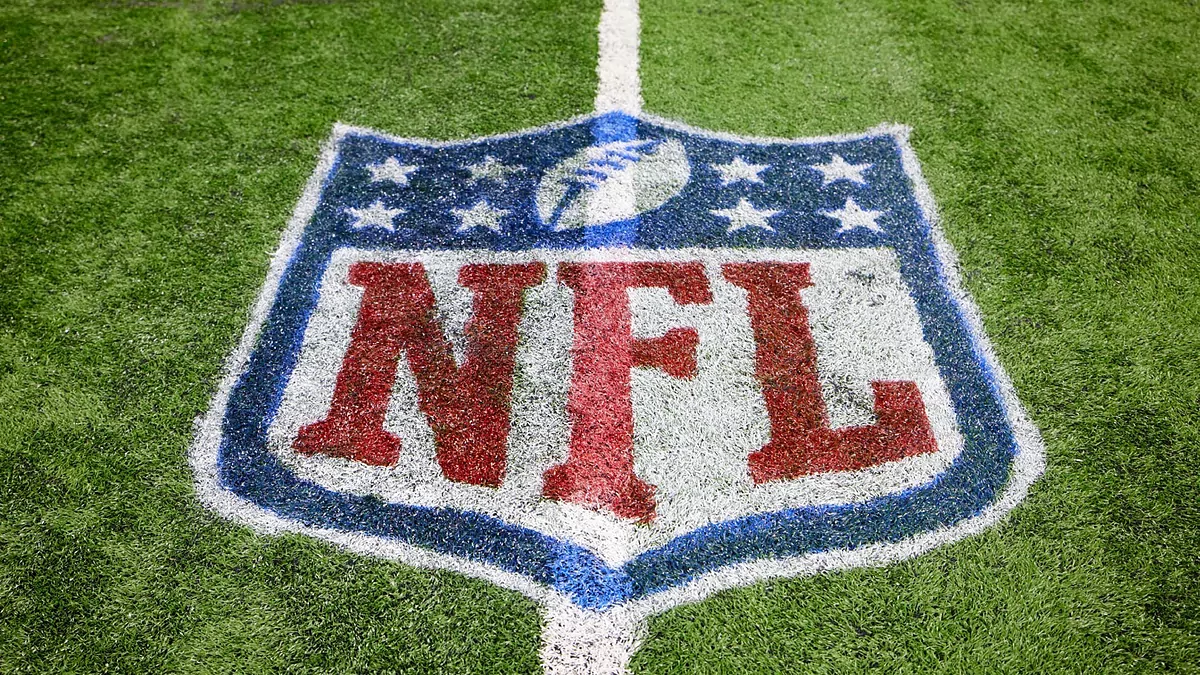 NFL logo painted over artifical turf