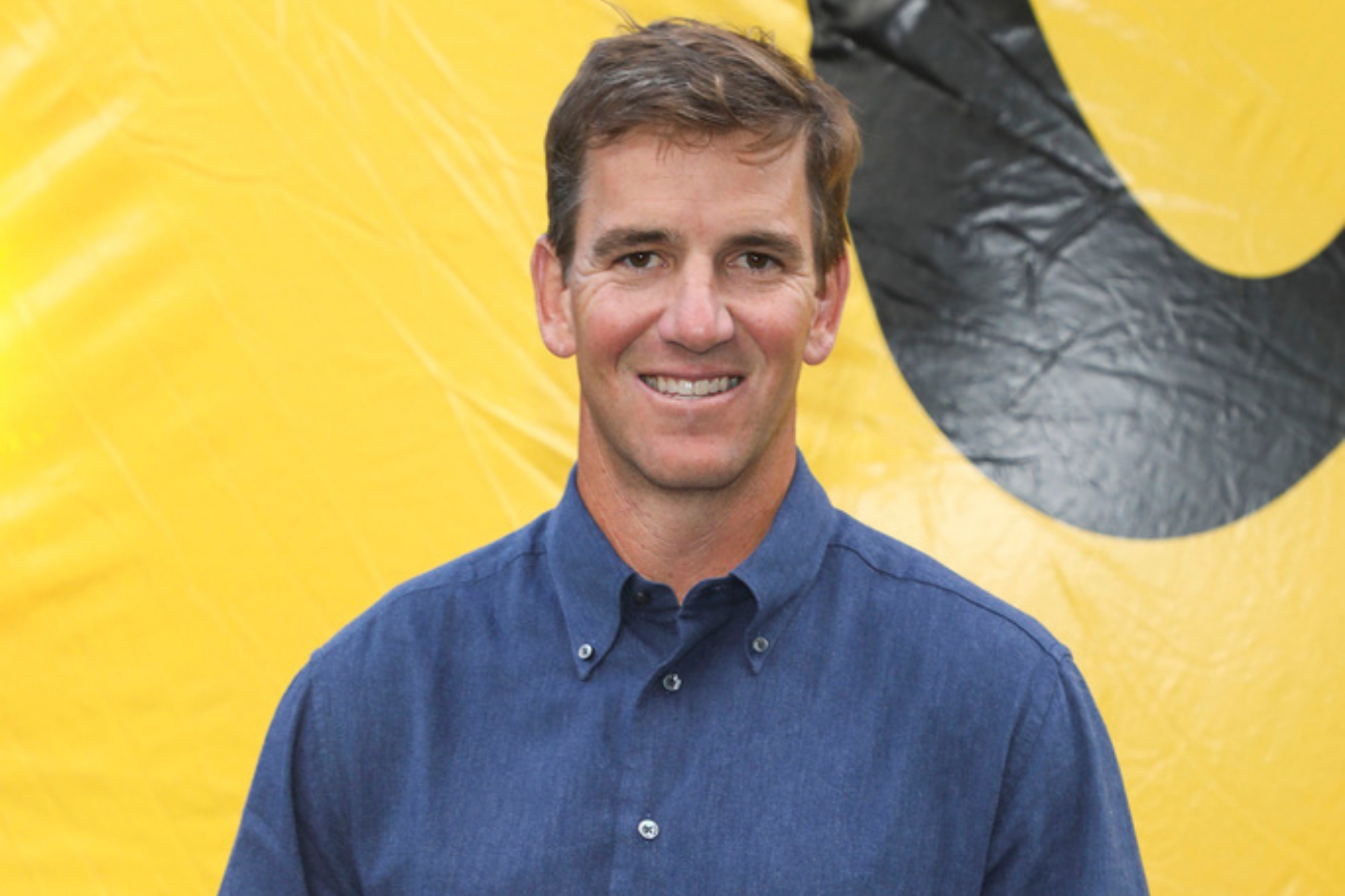 Former professional football player Eli Manning