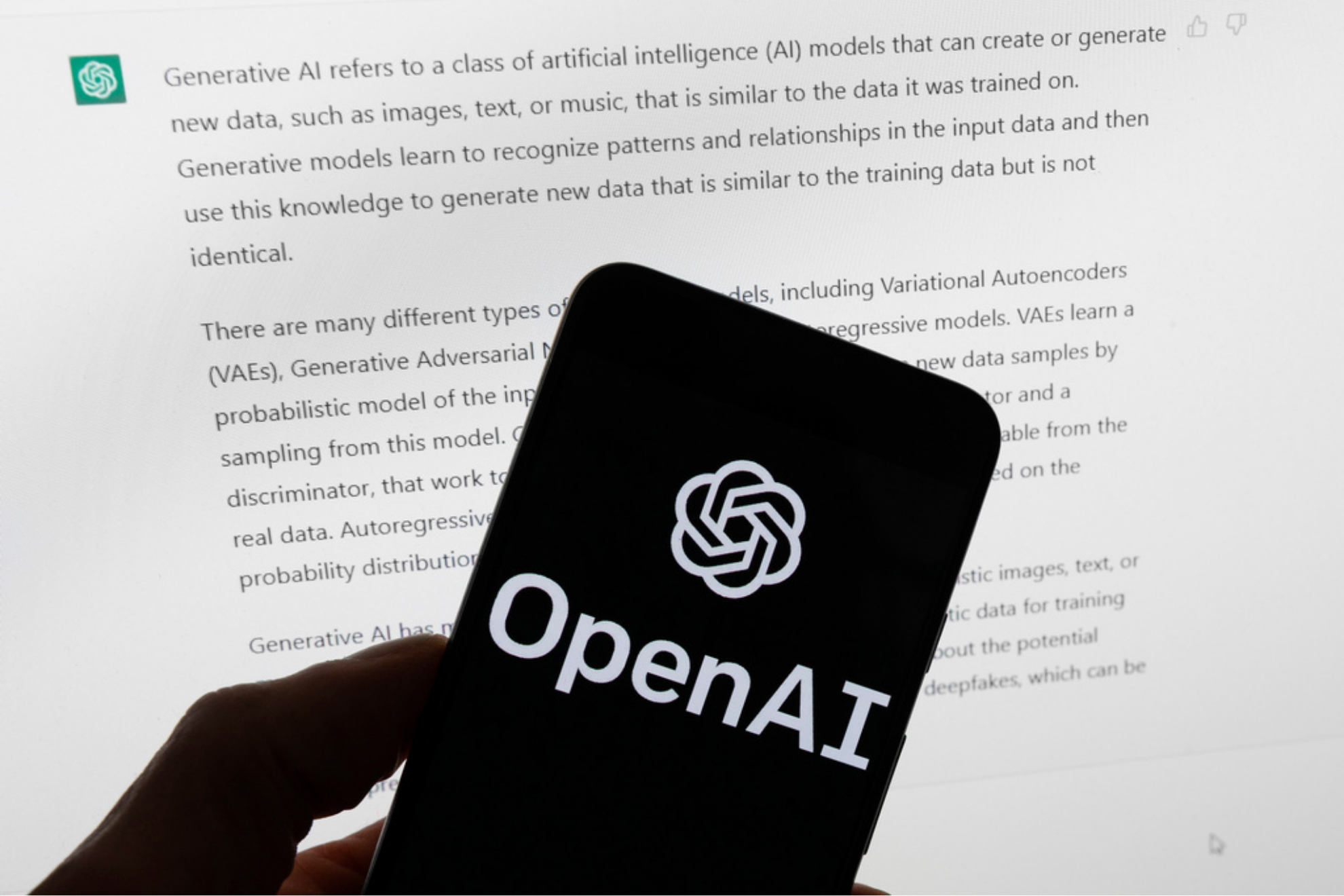 The OpenAI logo is displayed on a mobile phone