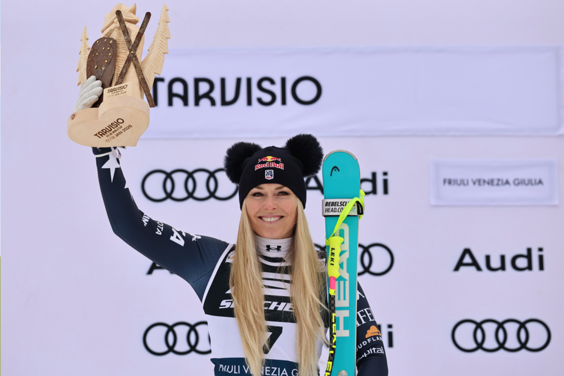 United States Lindsey Vonn celebrates on the podium after taking second place in an alpine ski