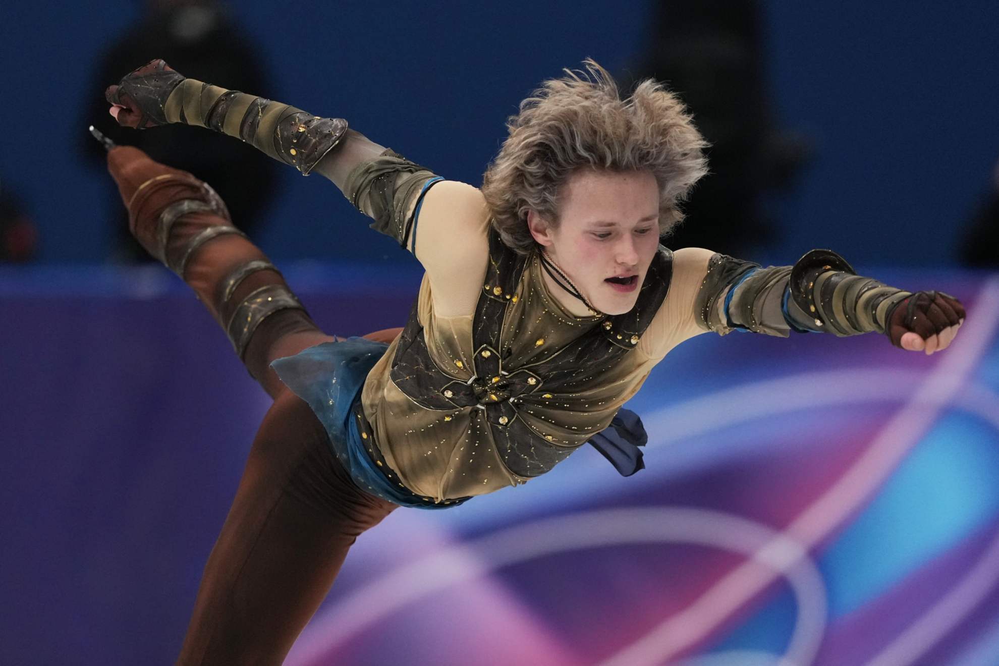 A bittersweet start for Team USA as Malinin struggles and Chock and Bates steal the spotlight.