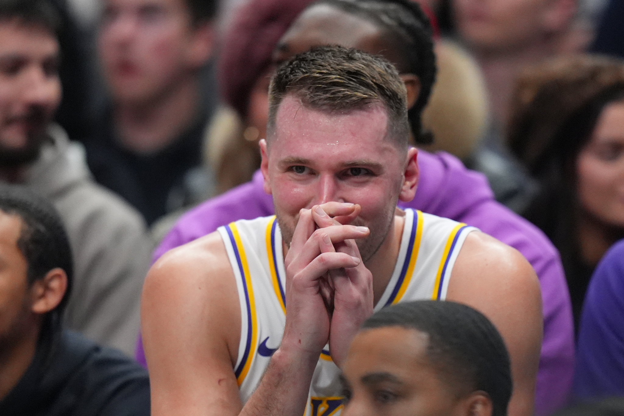 Los Angeles Lakers guard Luka Doncic reacts on the bench during an NBA basketball game against the Dallas Mavericks