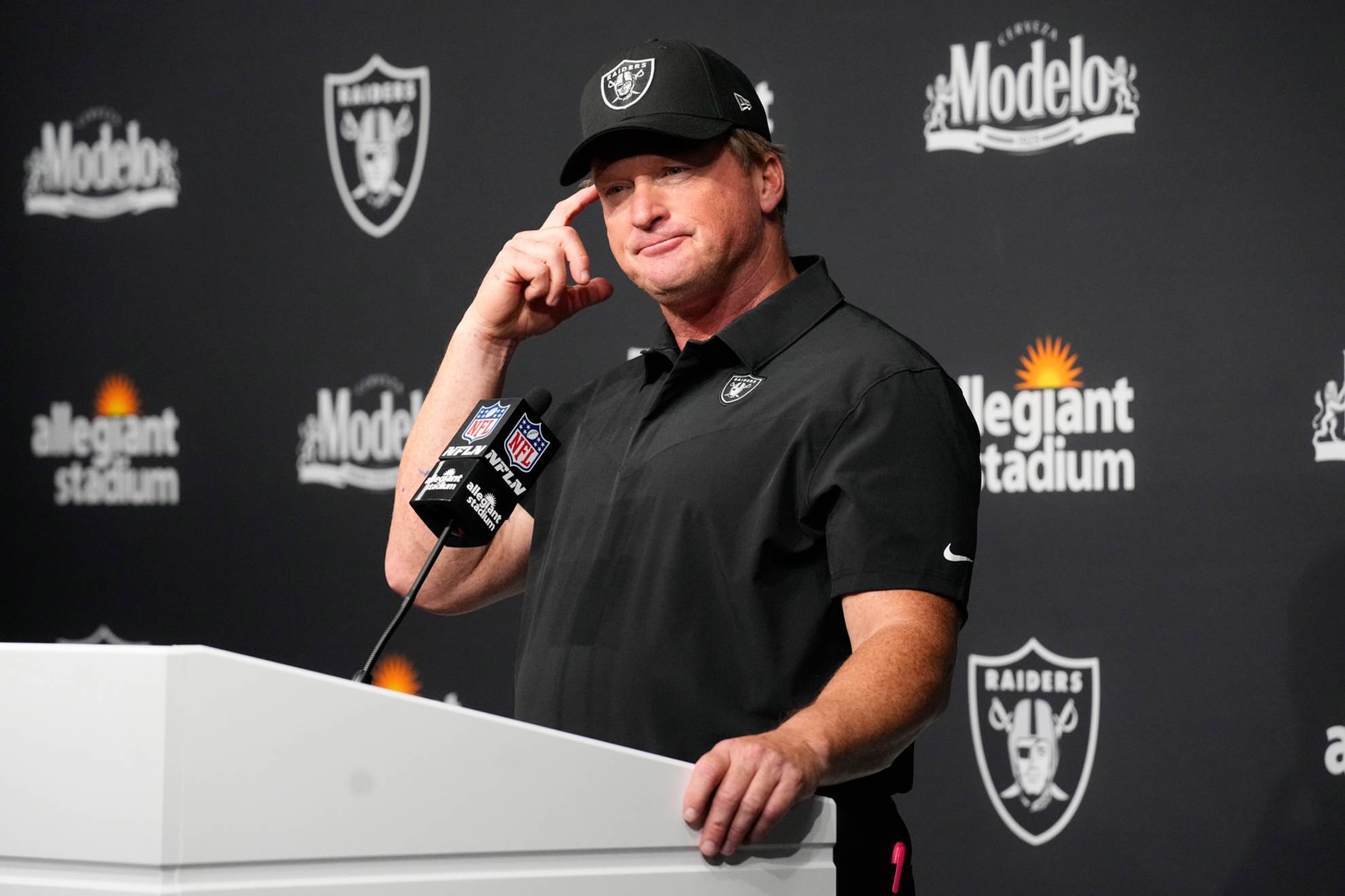 Gruden optimism contrasts with dark chapter of email scandal.