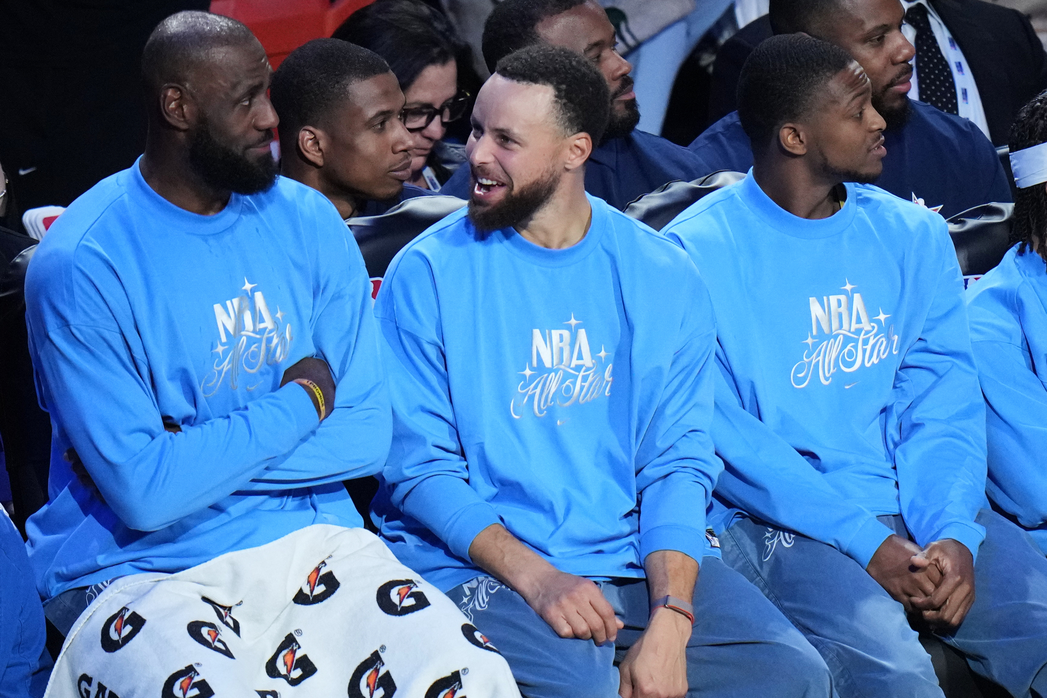 USA Stripes guard Stephen Curry speaks to LeBron James during the All-Star game against the USA Starsq