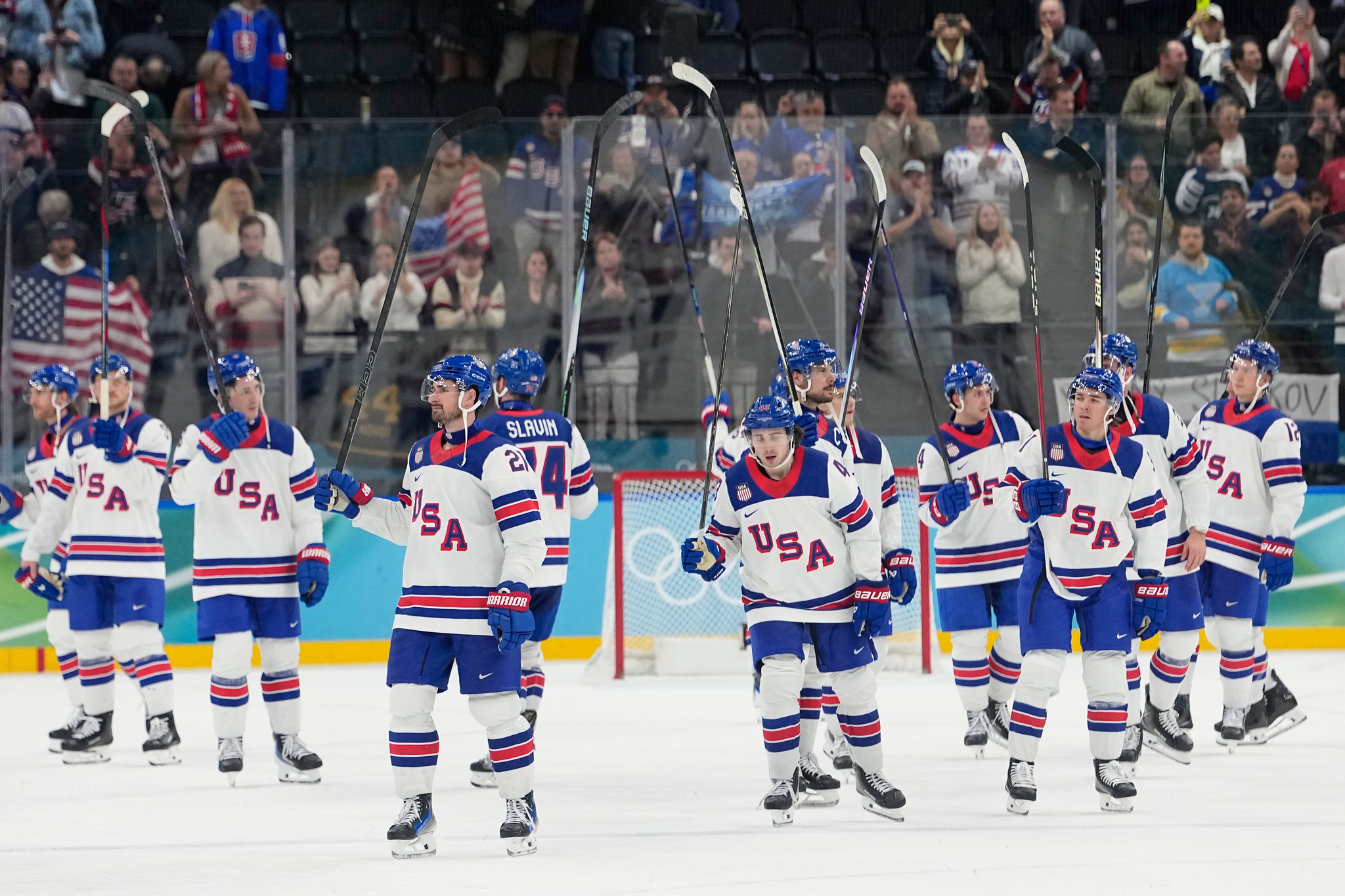 United States players celebrate at the end of a mens ice hockey semifinal game between the United States and Slovakia