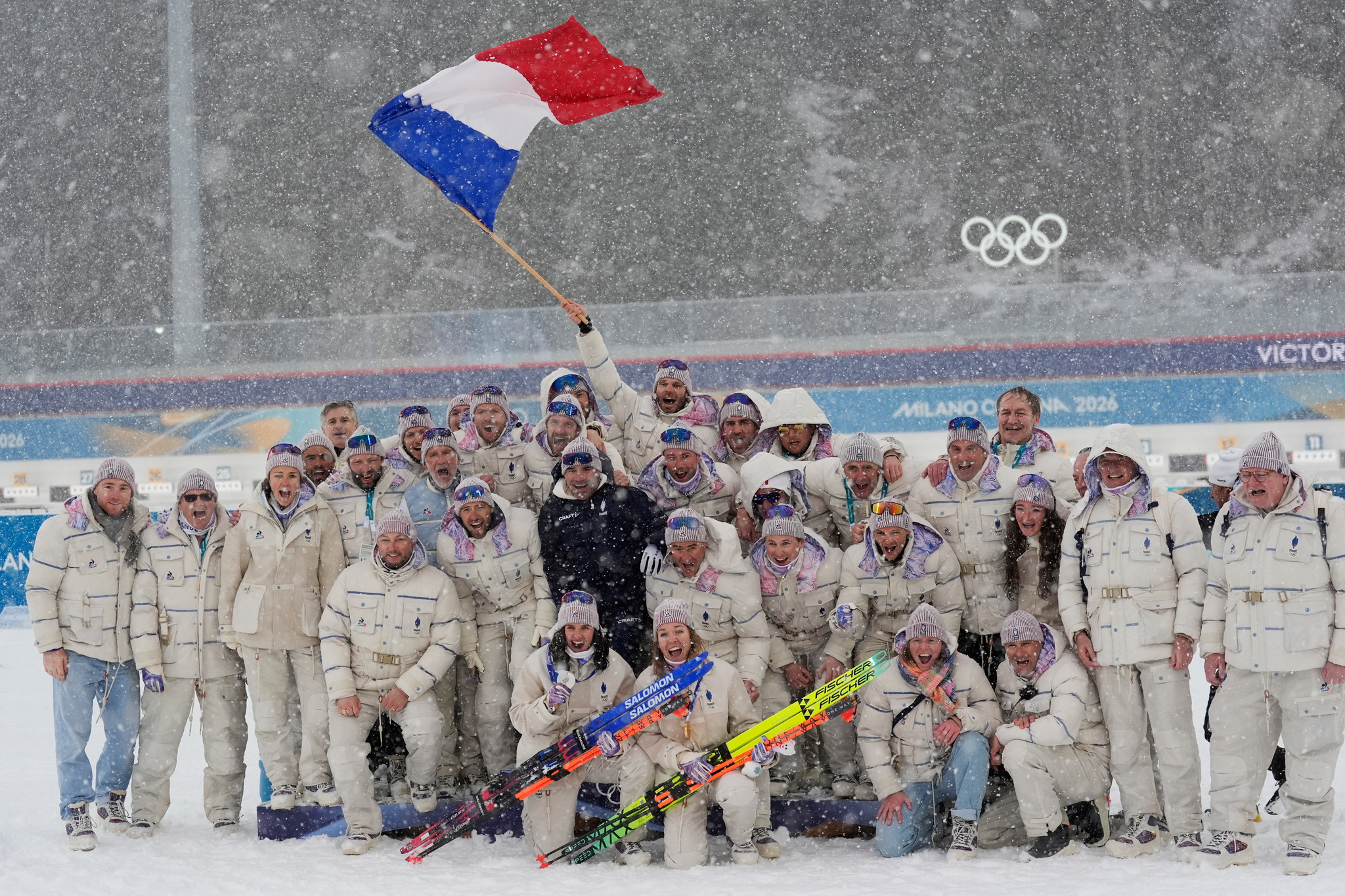 Gold medalist Oceane Michelon, of France, and silver medalist Julia Simon, of France, poses after the womens 12.5-kilometer mass start biathlon