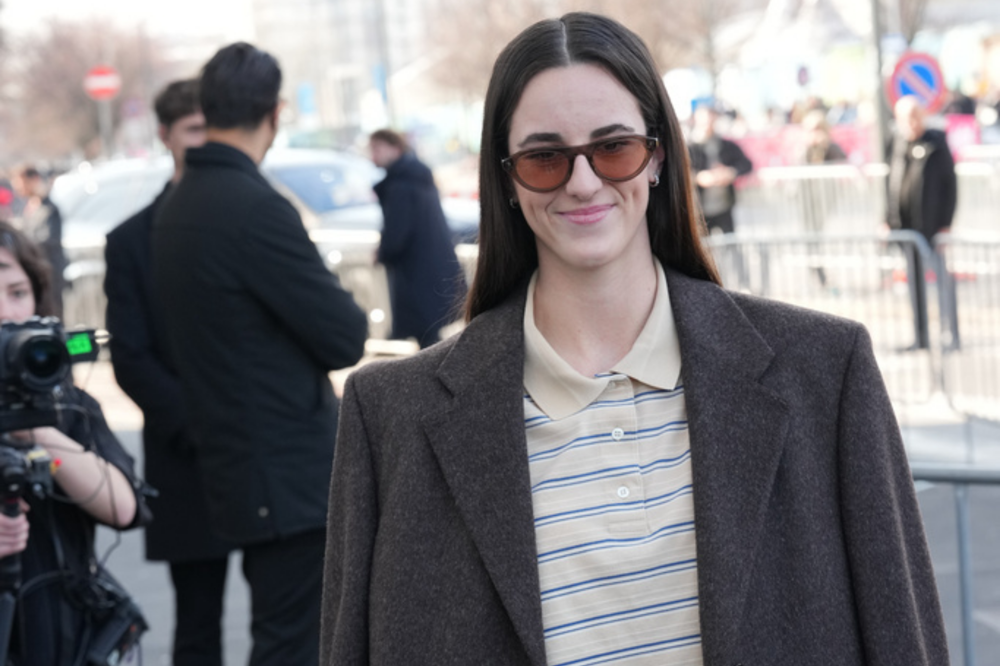 Caitlin Clark arrives for the Prada Fall/Winter 2026-2027 Womens collection presented in Milan, Italy