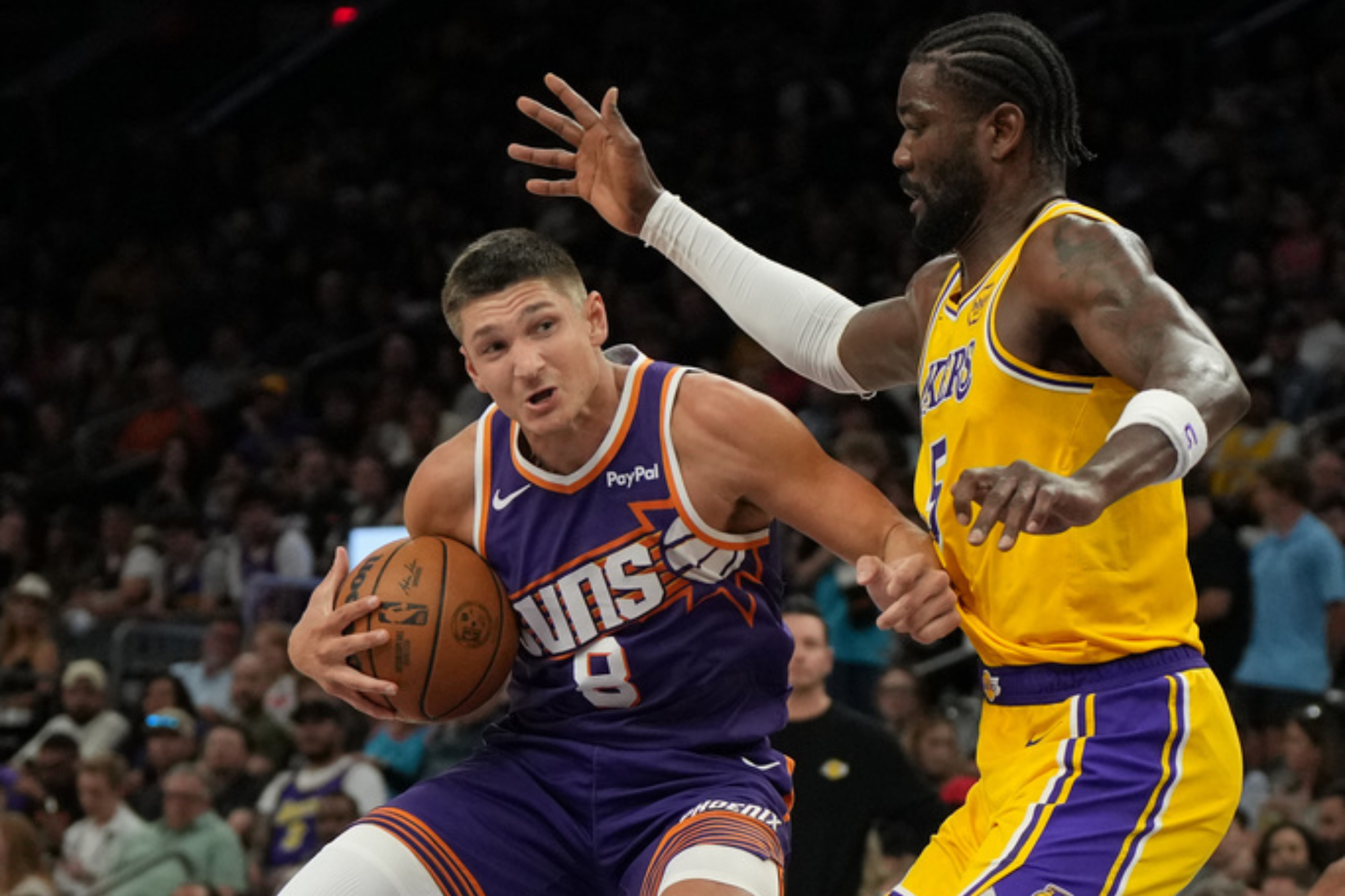Phoenix Suns guard Grayson Allen drives on Los Angeles Lakers center Deandre Ayton