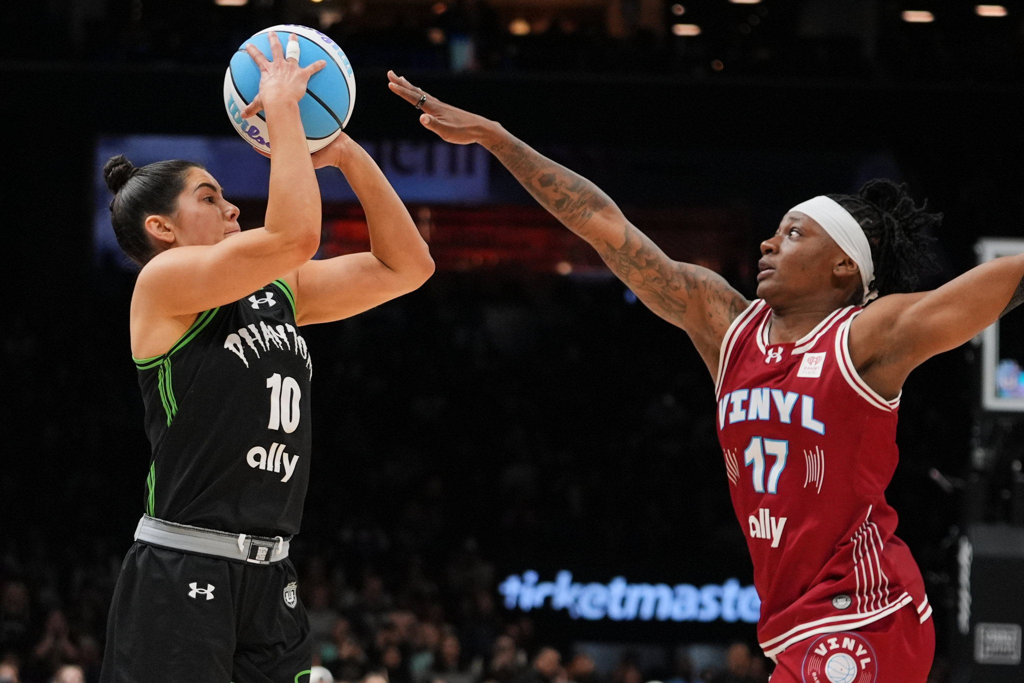 Phantom BC guard Kelsey Plum (10) shoots over Vinyl BC guard Erica Wheeler (17) during the second half of a semifinal in their Unrivaled 3-on-3 basketball game,