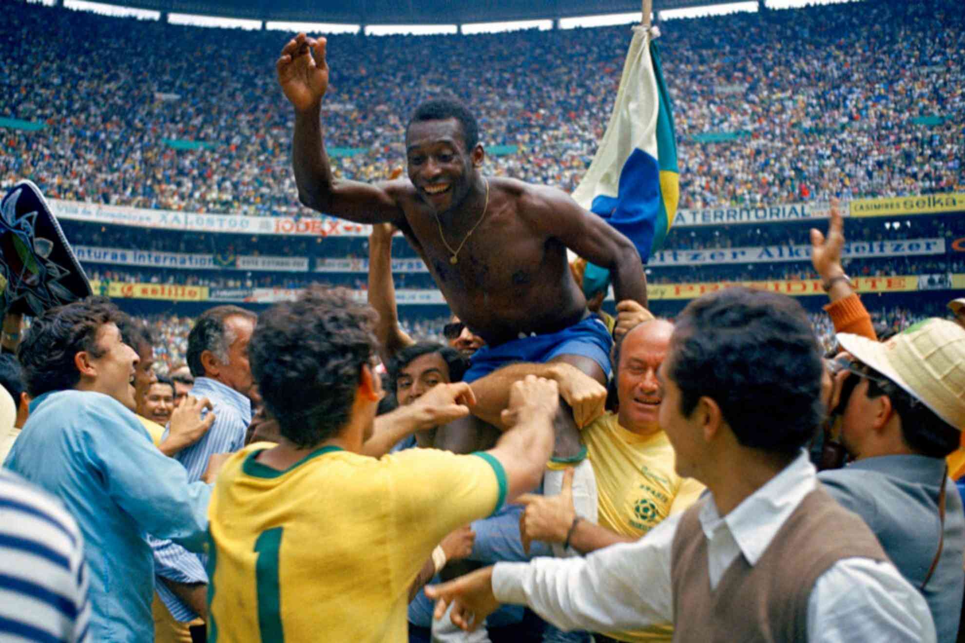 Brazils Pele is hoisted on the shoulders of his teammates after Brazil won the World Cup final against Italy, 4-1, in Mexico Citys Estadio Azteca, June 21, 1970