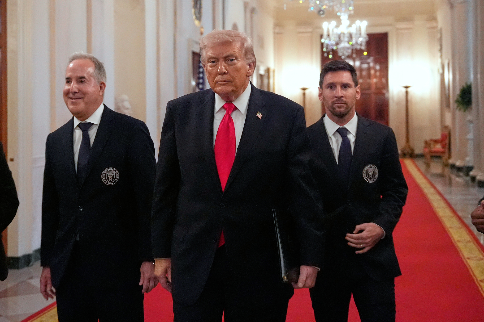 Lionel Messi, right, and Inter Miami CF owner Jorge Mas Santos arrive with President Donald Trump at an event to honor the 2025 MLS champions Inter Miami CF in the White House