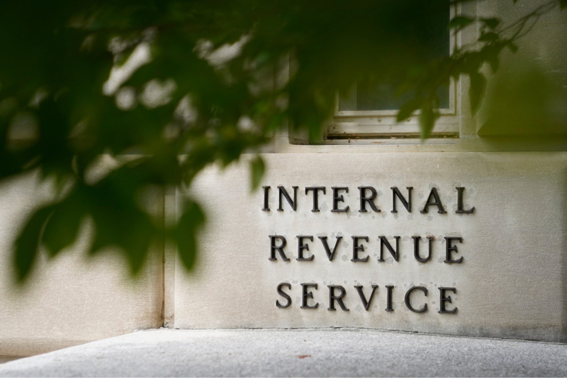 sign is displayed outside the Internal Revenue Service building