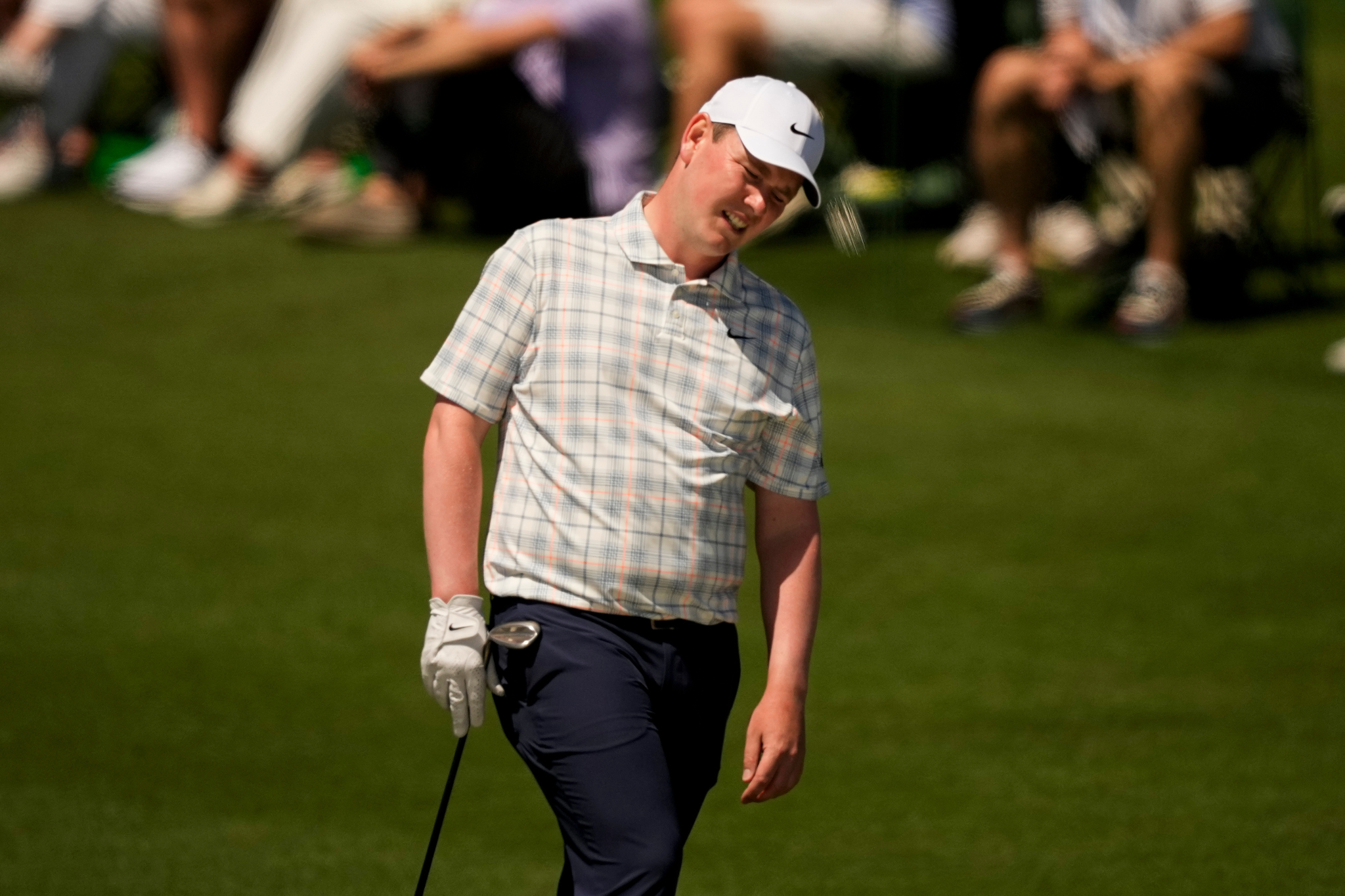 Robert MacIntyre laments a missed putt at the 2026 Masters Tournament.