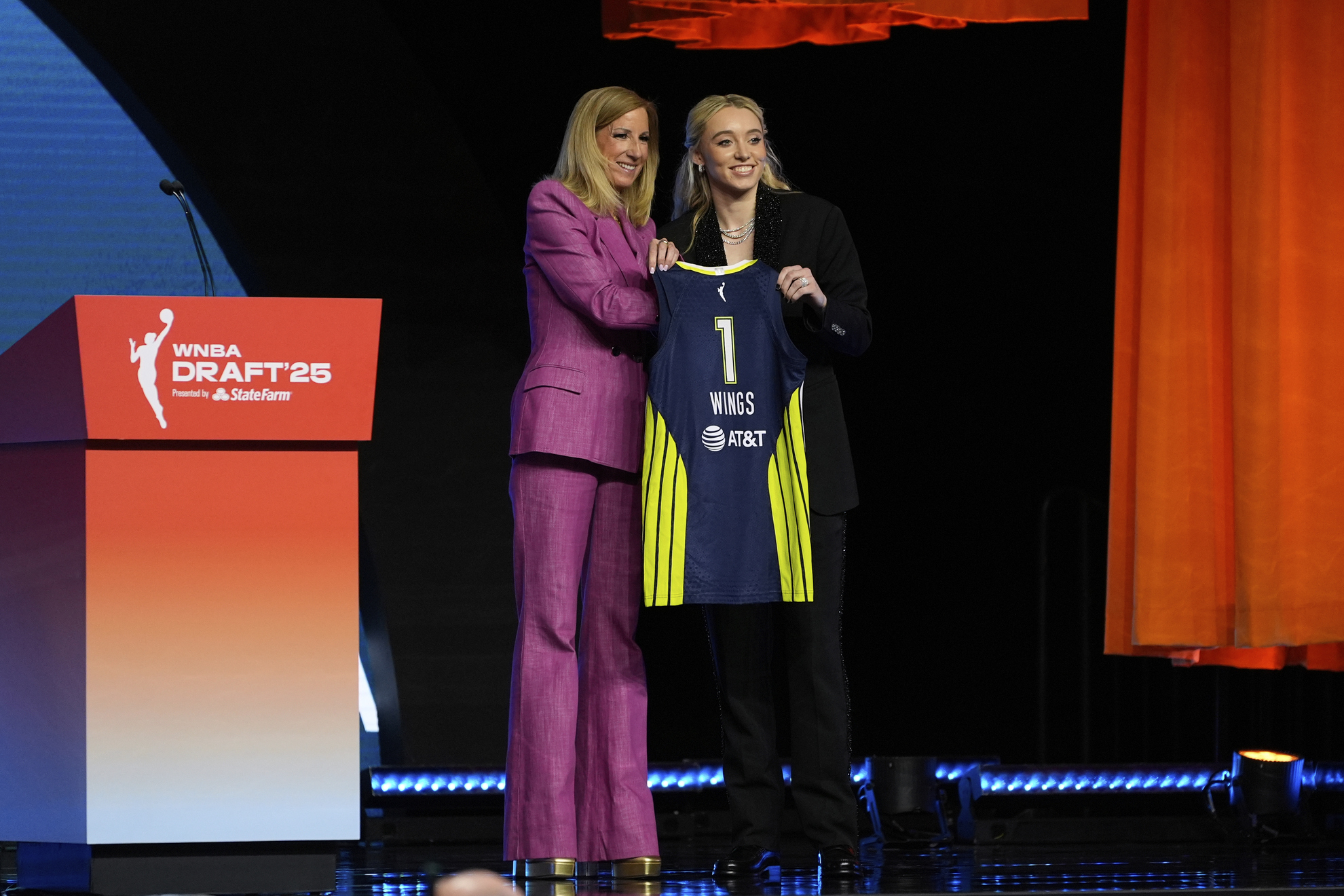Paige Bueckers poses for a photo with WNBA commissioner Cathy Engelbert