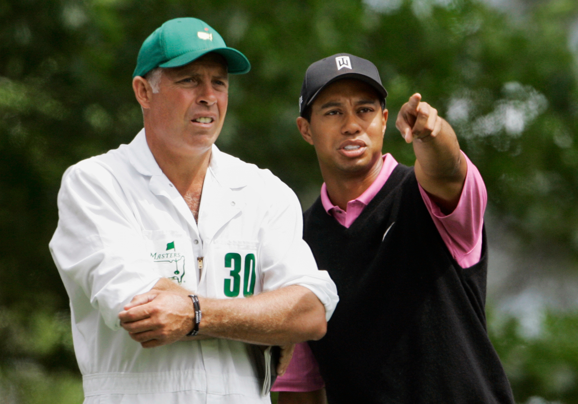 Steve Williams (left) was the caddie for Tiger Woods (right) from 1999 to 2011.