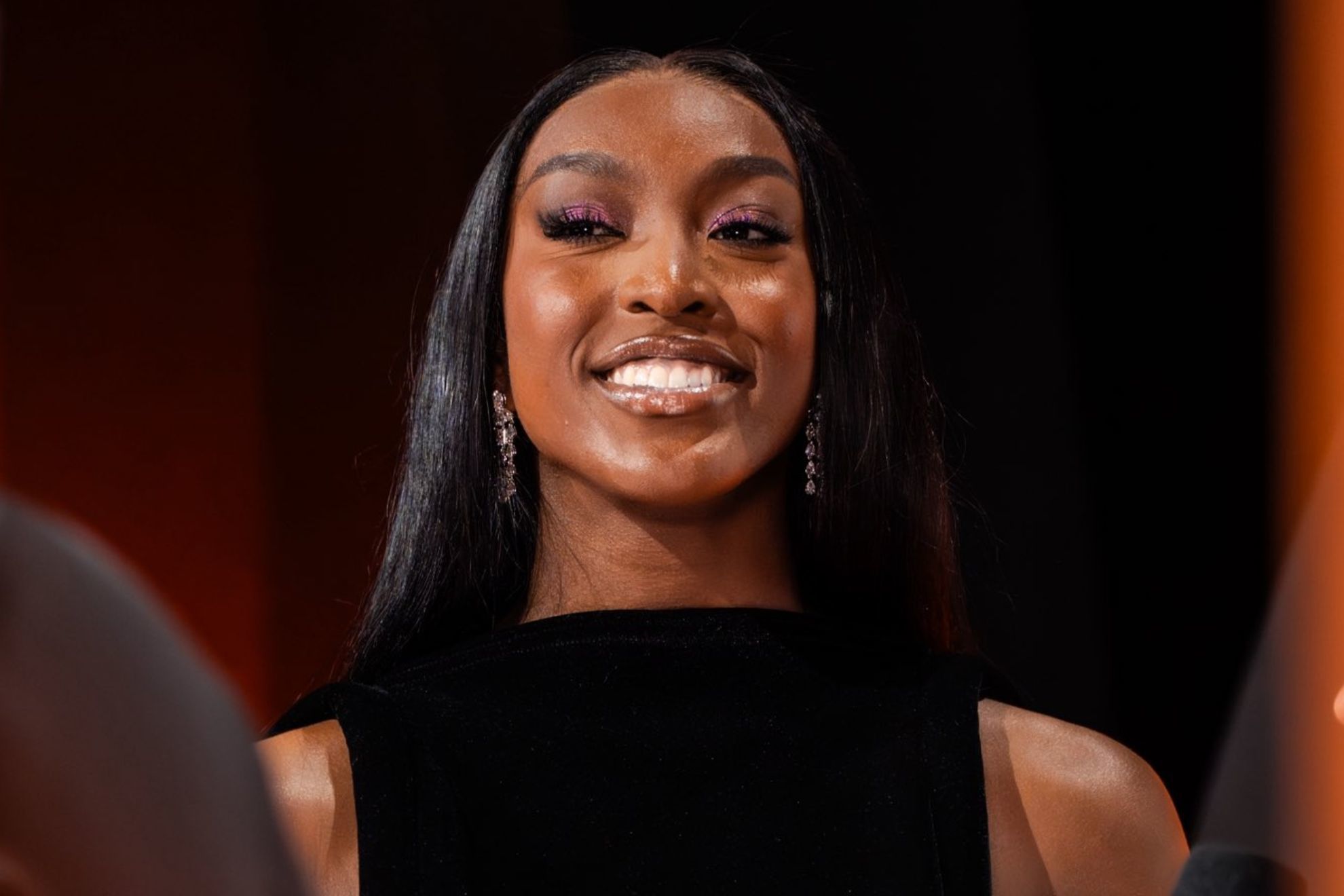 Flaujae Johnsons little brother ends up on stage after stealing the spotlight at the WNBA Draft