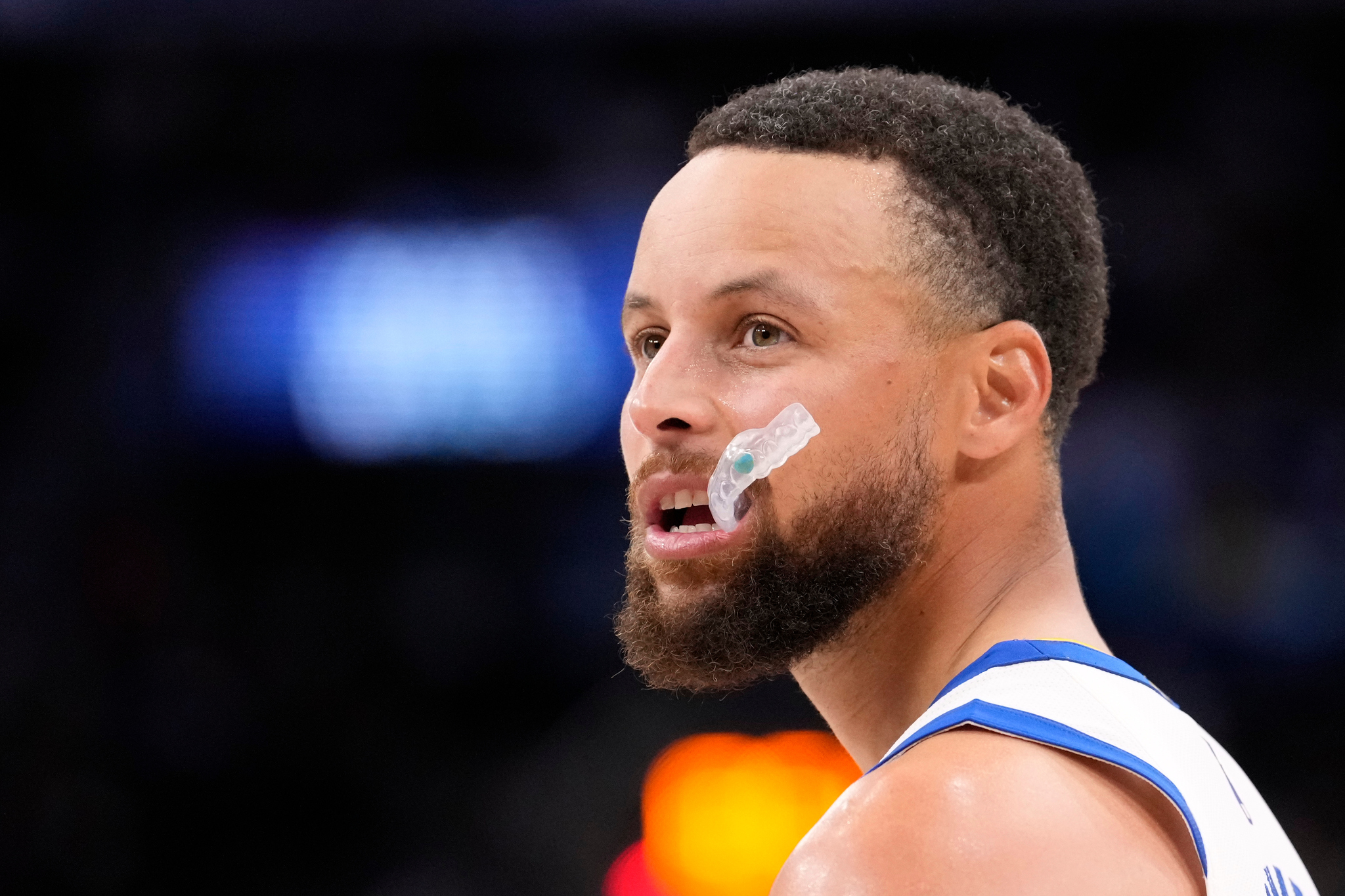 Golden State Warriors guard Stephen Curry stands on the court during an NBA play-in tournament basketball game against the Los Angeles Clippers