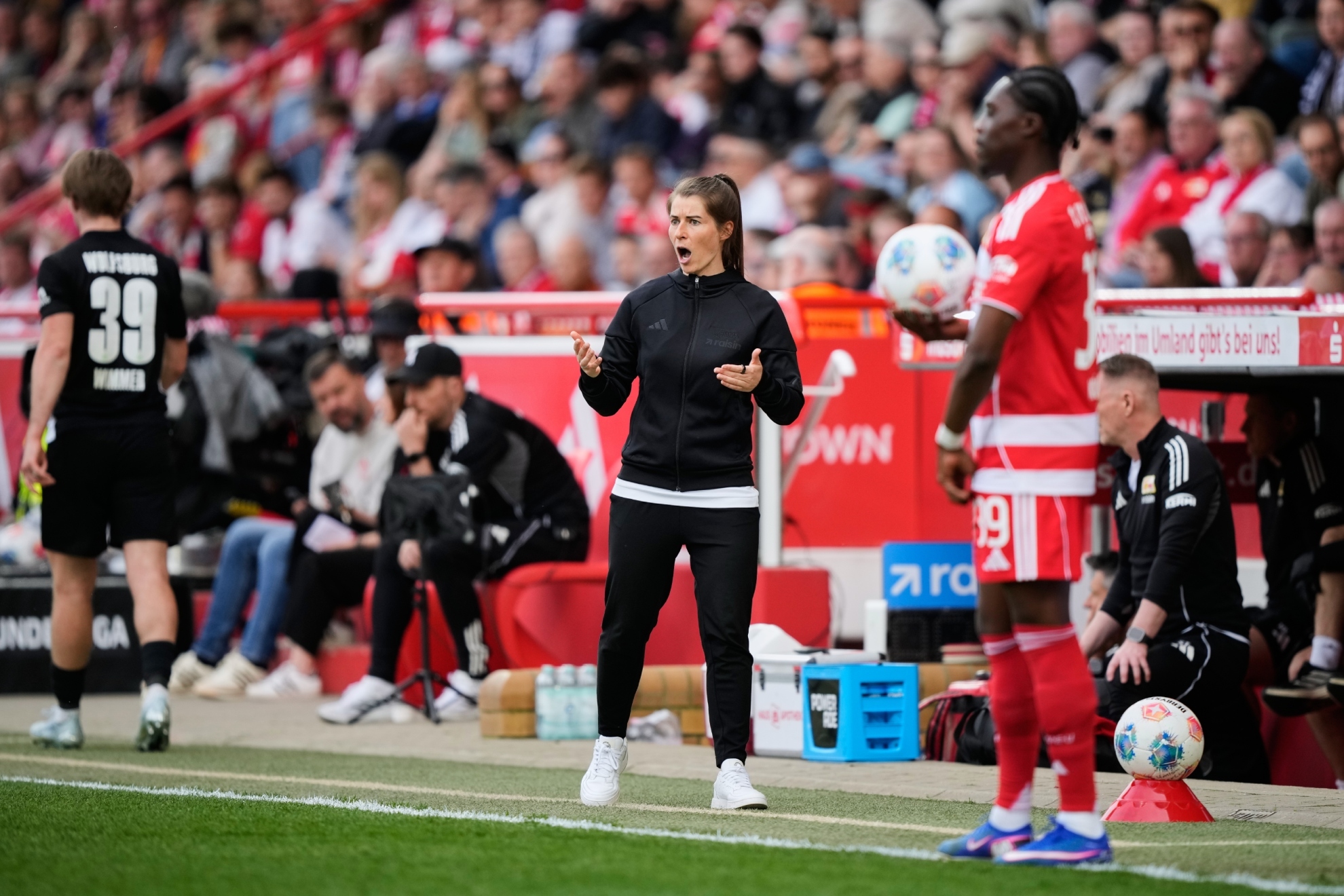New head coach of German Bundesliga soccer club 1. FC Union Berlin Marie-Louise Eta reacts.