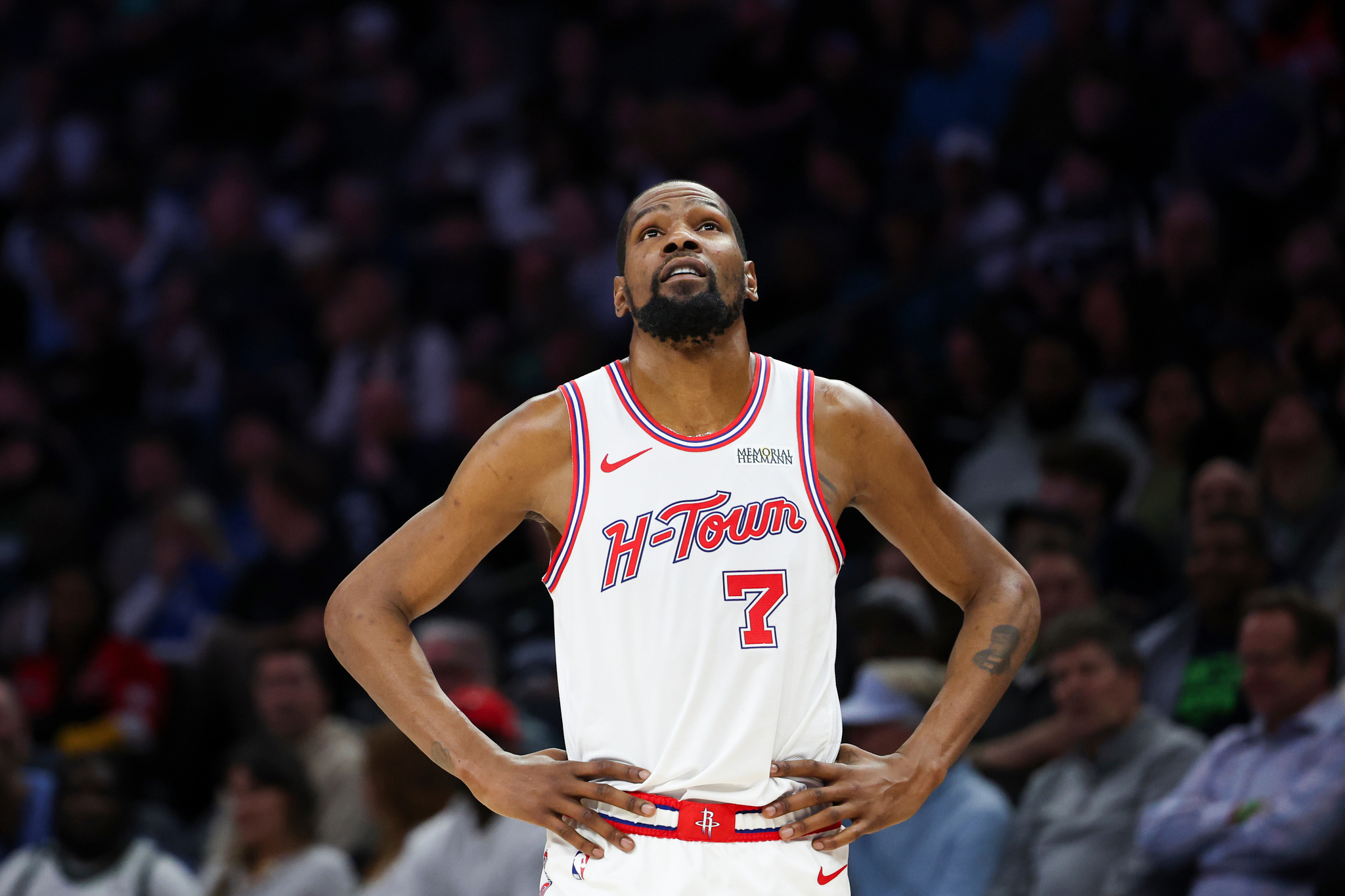 Houston Rockets forward Kevin Durant watches during an NBA basketball game against the Minnesota Timberwolves.