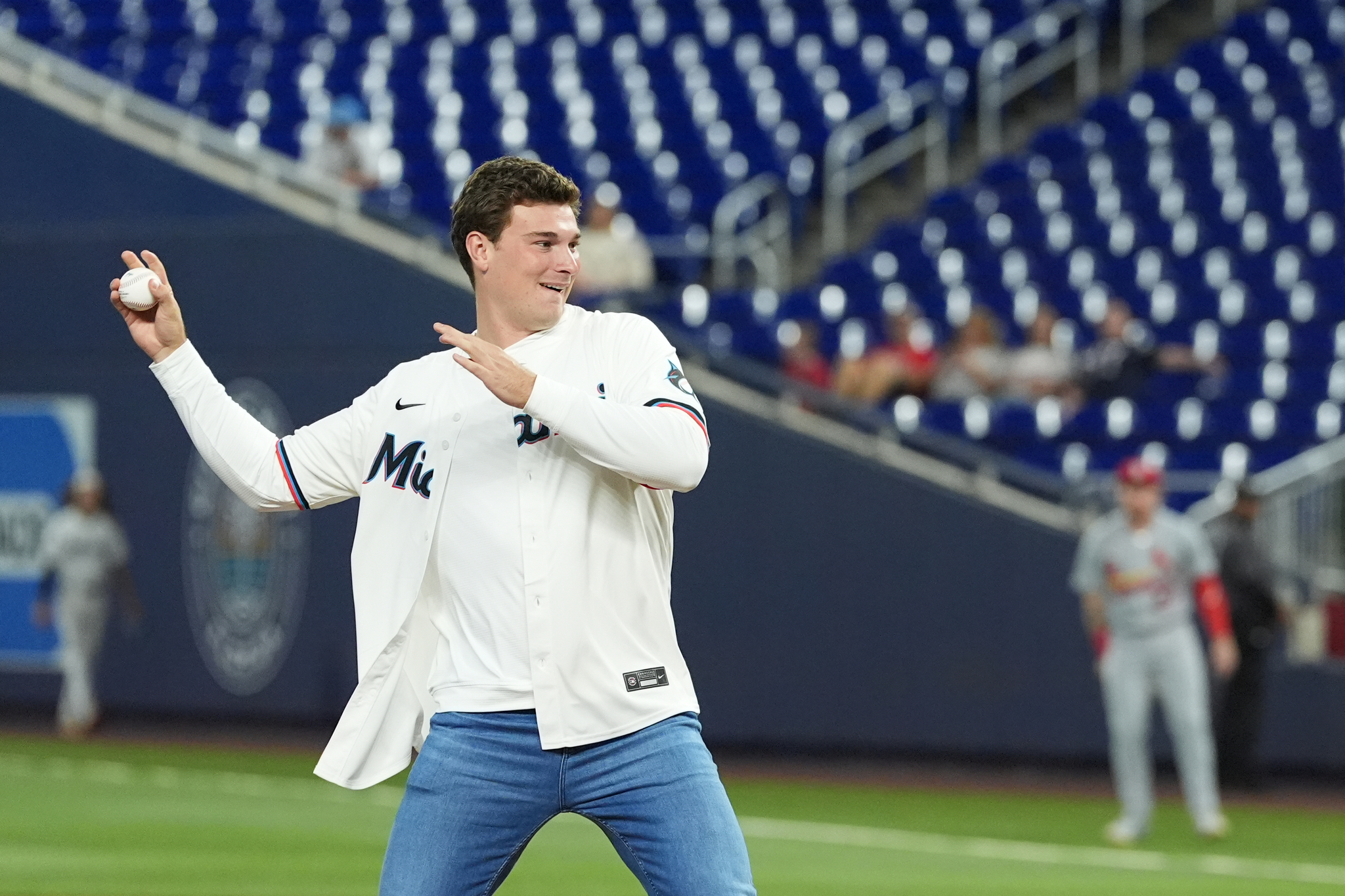 Indiana quarterback Fernando Mendoza throws a first pitch before a Miami Marlins game.