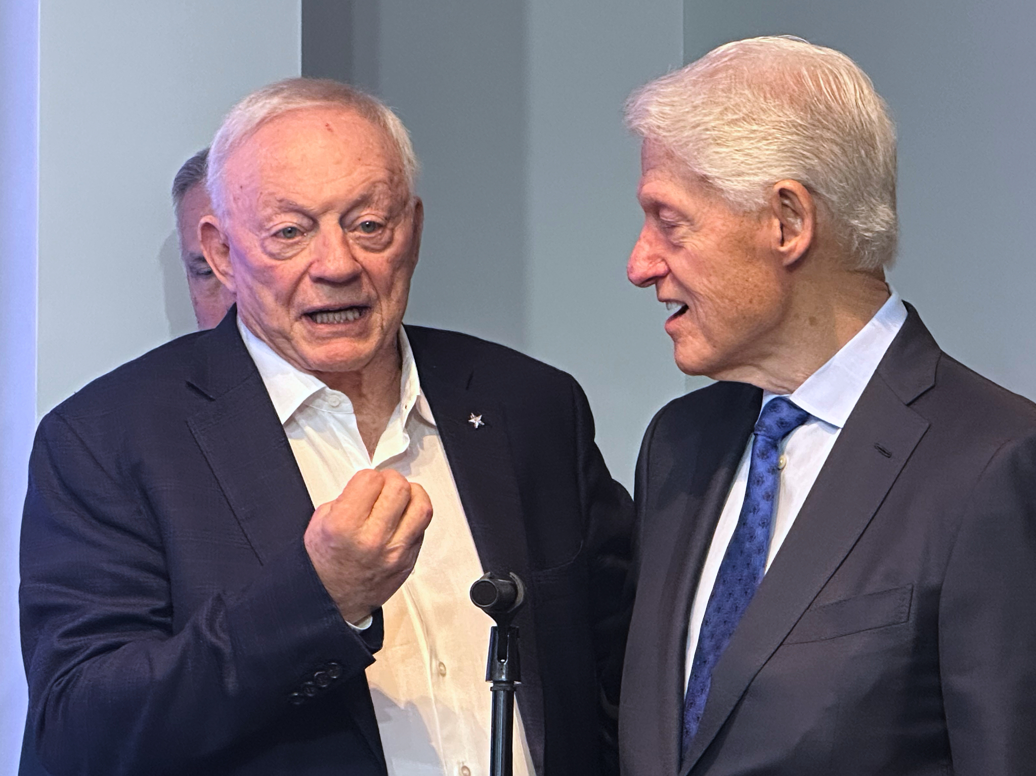 Former President Bill Clinton, right speaks with Dallas Cowboys owner  lt;HIT gt;Jerry lt;/HIT gt;  lt;HIT gt;Jones lt;/HIT gt;, left, during the NFL football team's pre-draft press conference Wednesday, April 22, 2026 in Frisco, Texas. (AP Photo/Schuyler Dixon)
