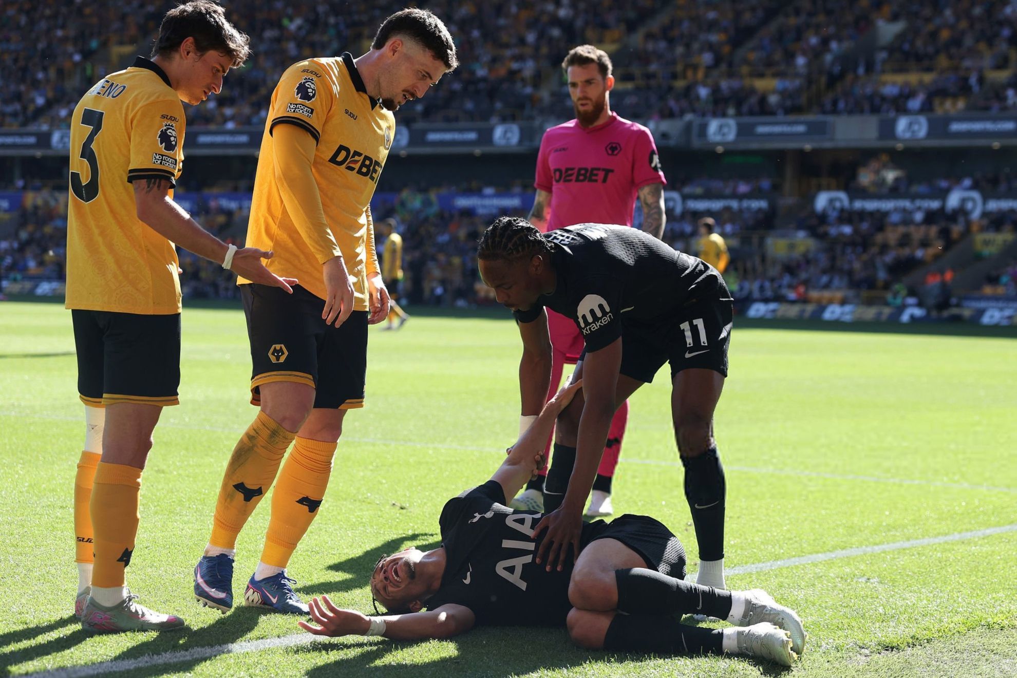 Xavi Simons is stretchered off after a worrying injury in the clash against Wolverhampton