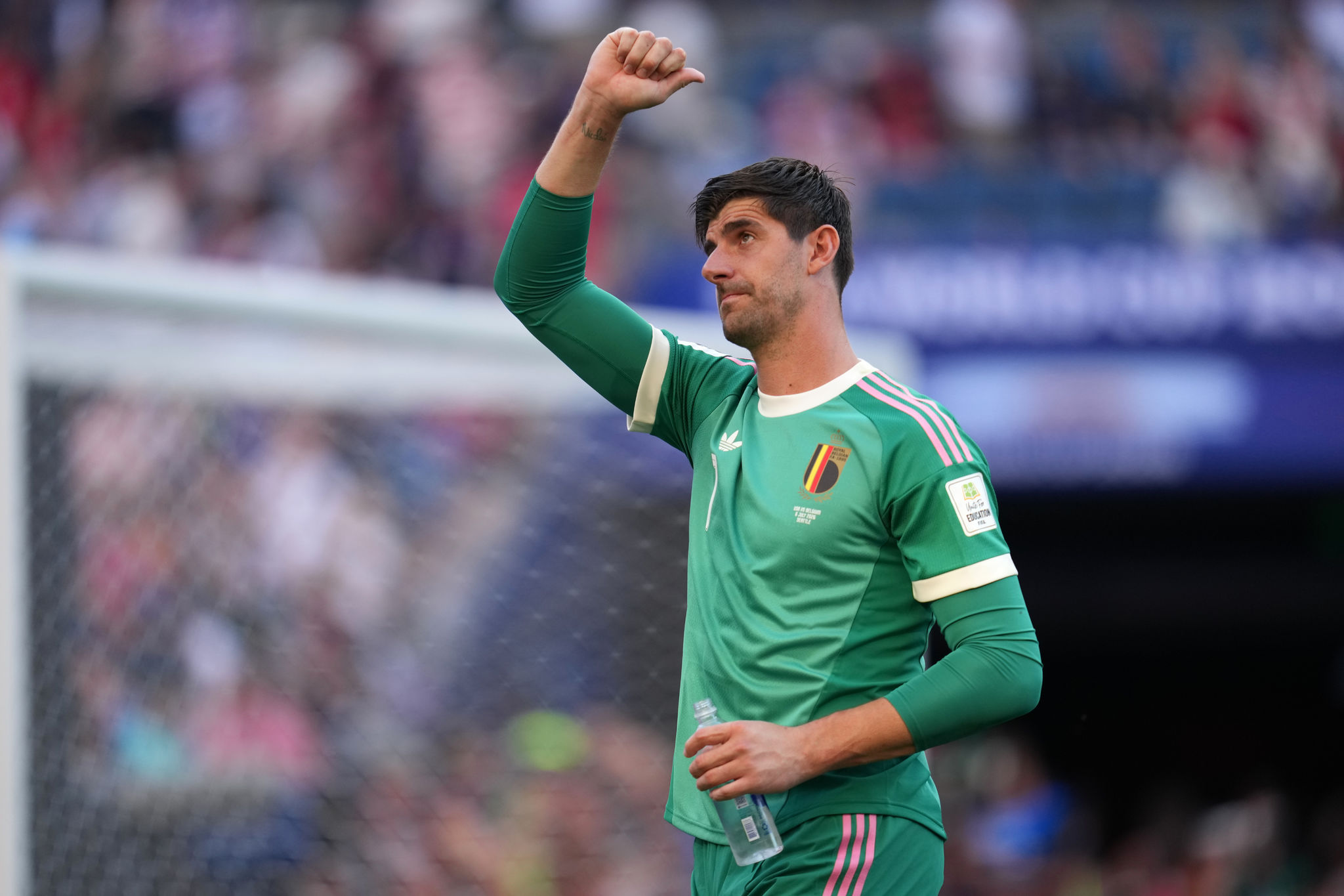 Belgium's Thibaut lt;HIT gt;Courtois lt;/HIT gt; reatcs after Belgium won a World Cup round of 16 soccer match against the United States in Seattle, Monday, July 6, 2026. (AP Photo/Abbie Parr)