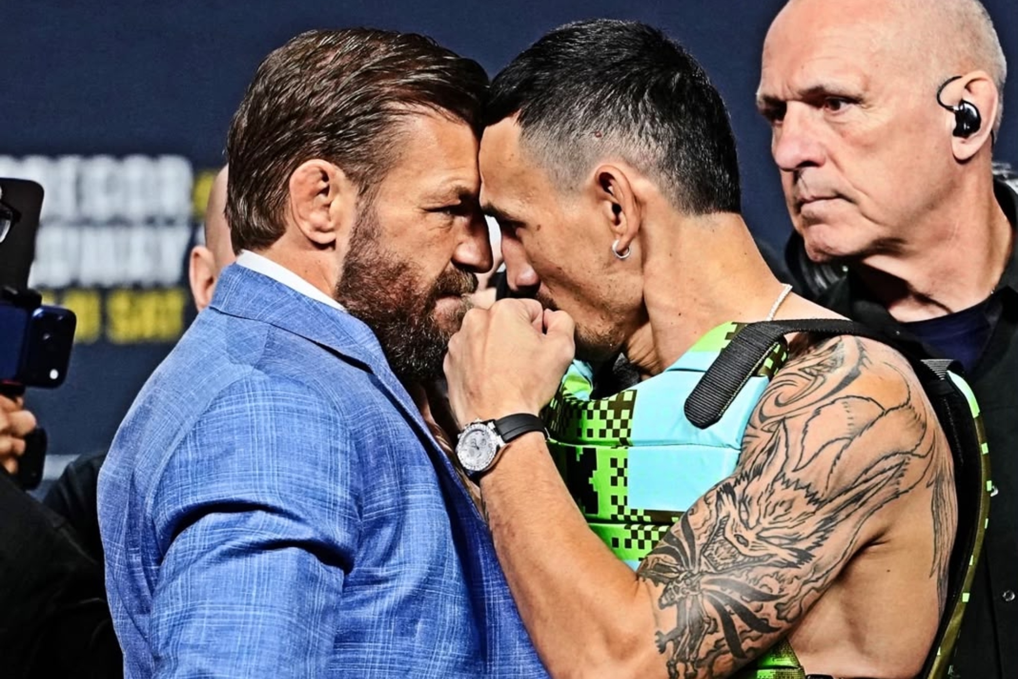 Conor McGregor y MAx Holloway durante su primer careo del UFC 329.