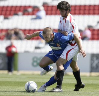 Lance del Sevilla Atl�tico-Girona que se jug� en la ma�ana de este domingo
