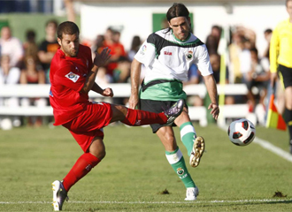 Lora y Cisma, durante el partido