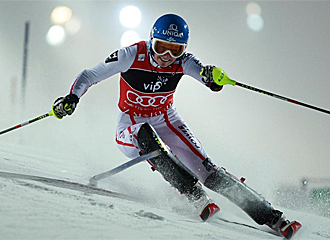 Schild supera una puerta en pleno descenso.